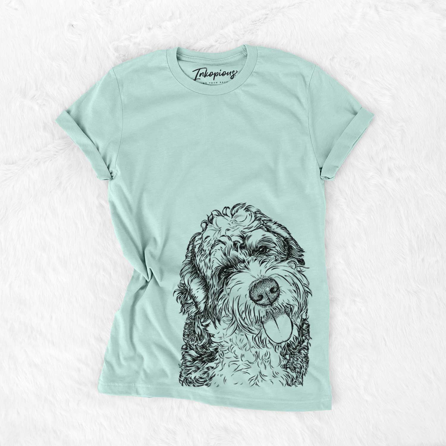 Hand-drawn sketch of Kaci the Bernedoodle on a Heather Sage Bella Canvas Unisex Crewneck
