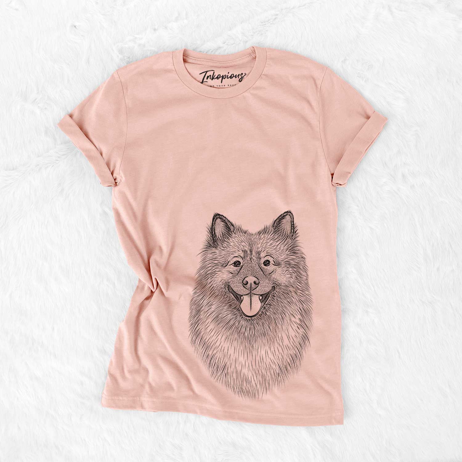 Hand-drawn sketch of Kai the Keeshond on a Peach Bella Canvas Unisex Crewneck