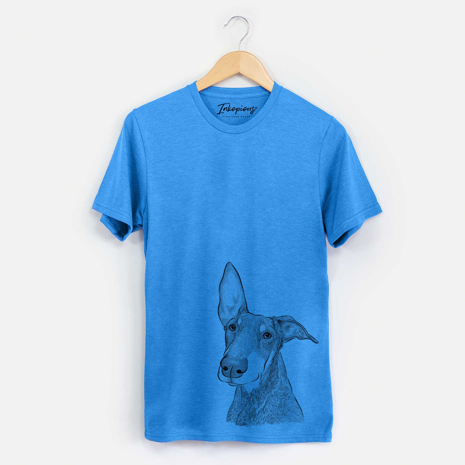 Hand-drawn sketch of Kain the Doberman Pinscher on a Blue Unisex crewneck