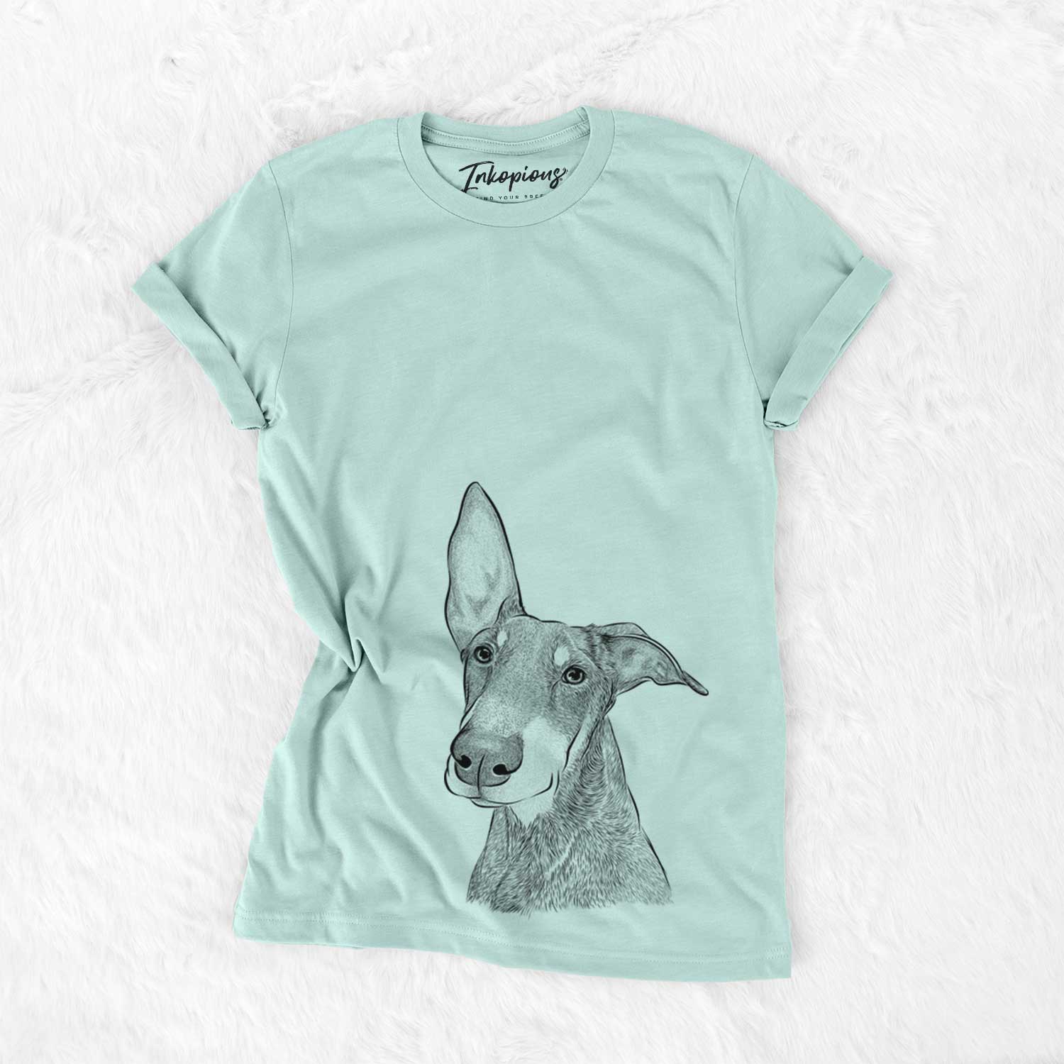 Hand-drawn sketch of Kain the Doberman Pinscher on a Heather Sage Bella Canvas Unisex Crewneck