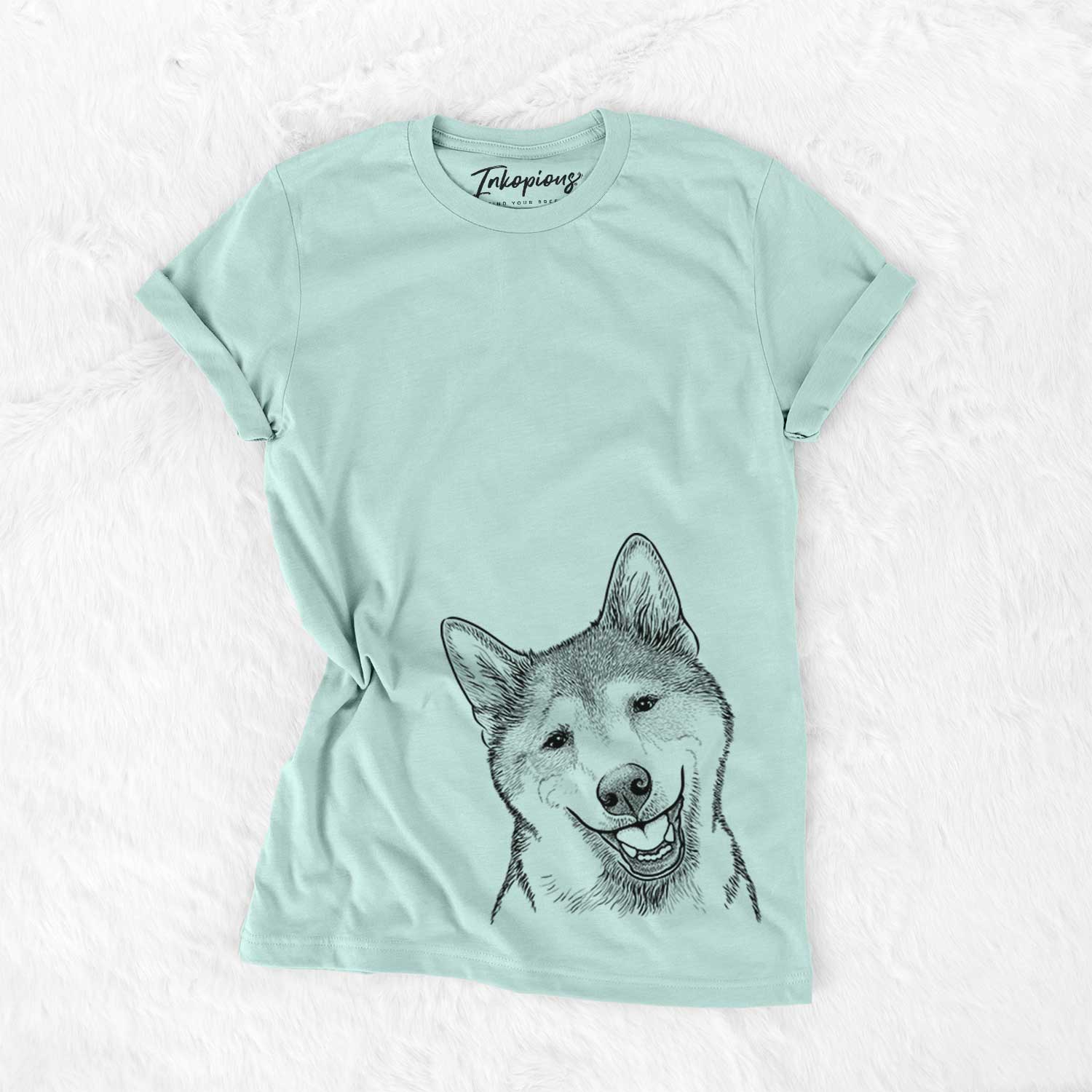 Hand-drawn sketch of Koby the Shiba Inu on a Heather Sage Unisex crewneck