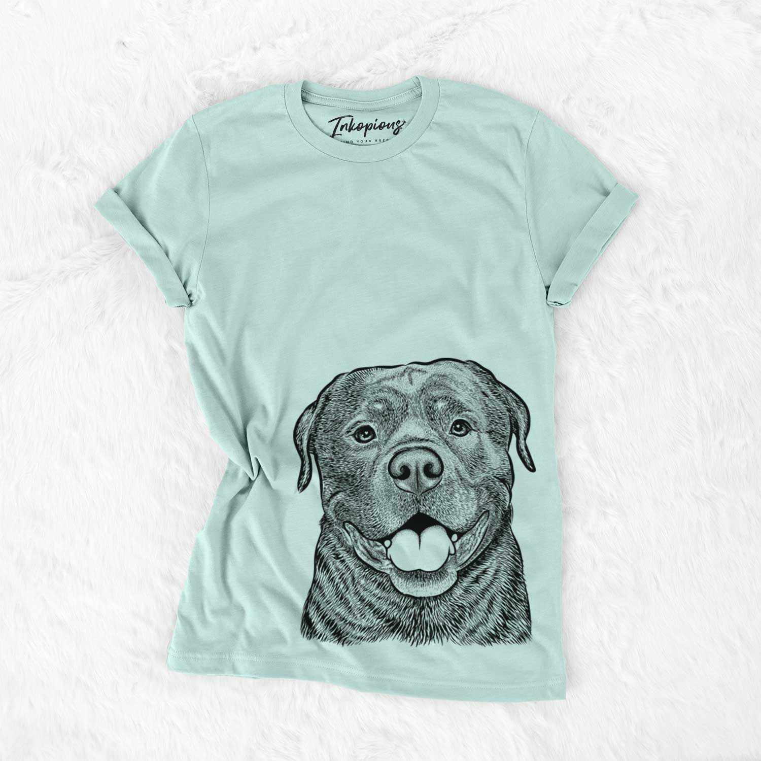 Hand-drawn sketch of Kojak the Rottweiler on a Heather Sage Unisex crewneck