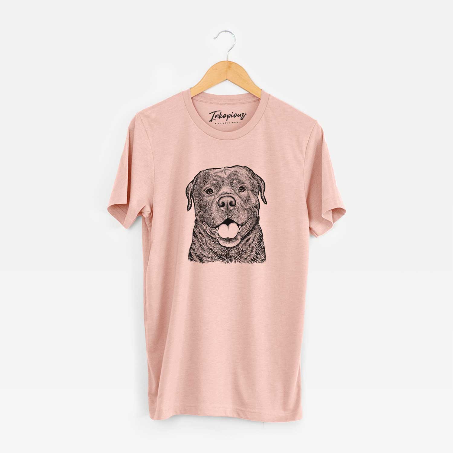 Hand-drawn sketch of Kojak the Rottweiler on a Peach Unisex crewneck