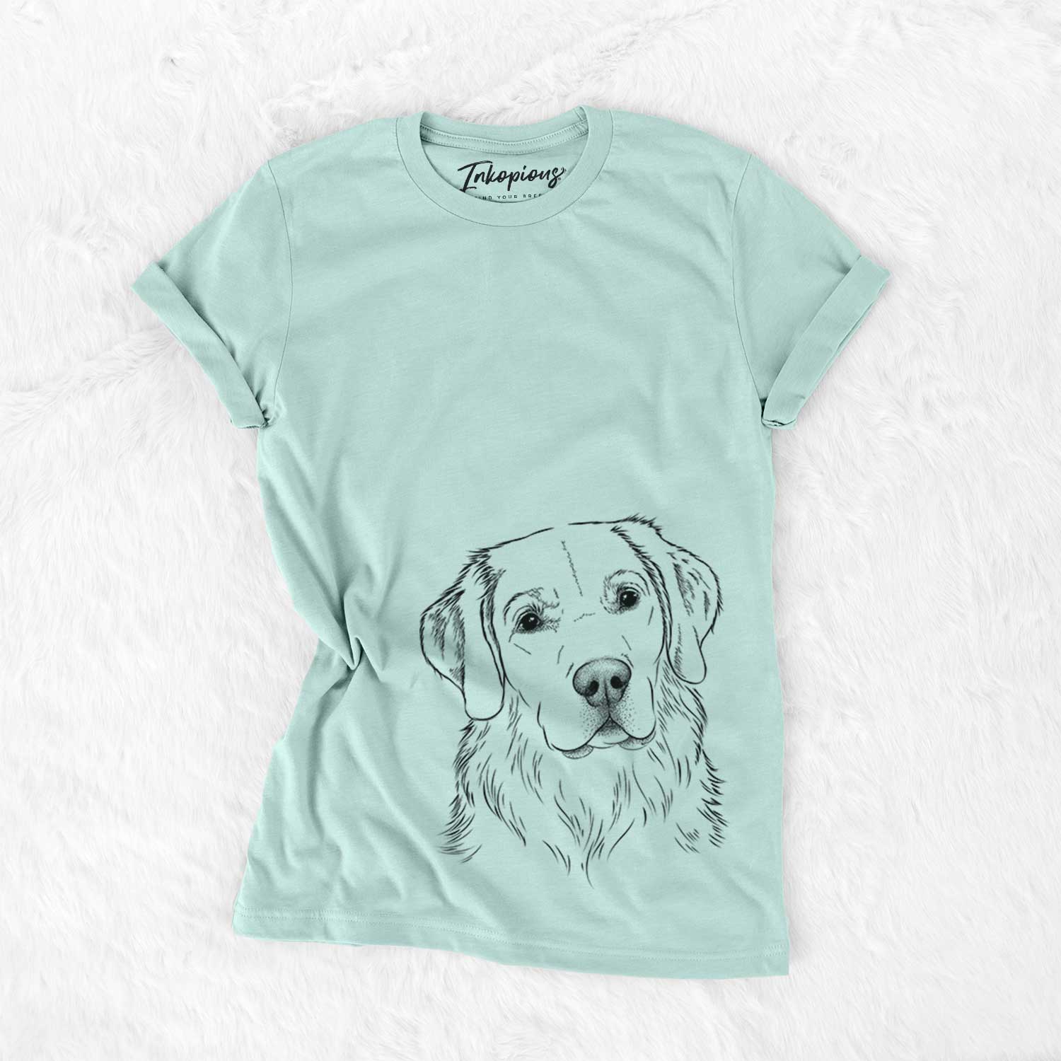 Hand-drawn sketch of Kula the Golden Retriever on a Heather Sage Unisex crewneck