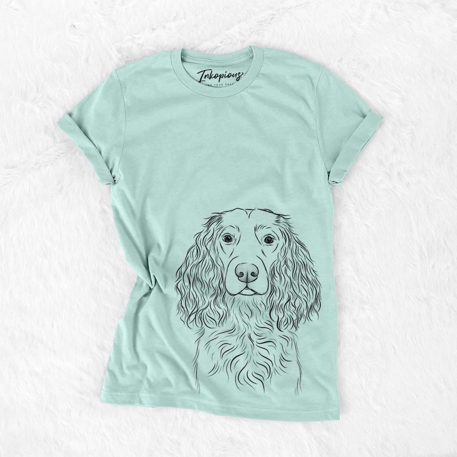 Hand-drawn sketch of Landry the Boykin Spaniel on a Heather Sage Bella Canvas Unisex Crewneck