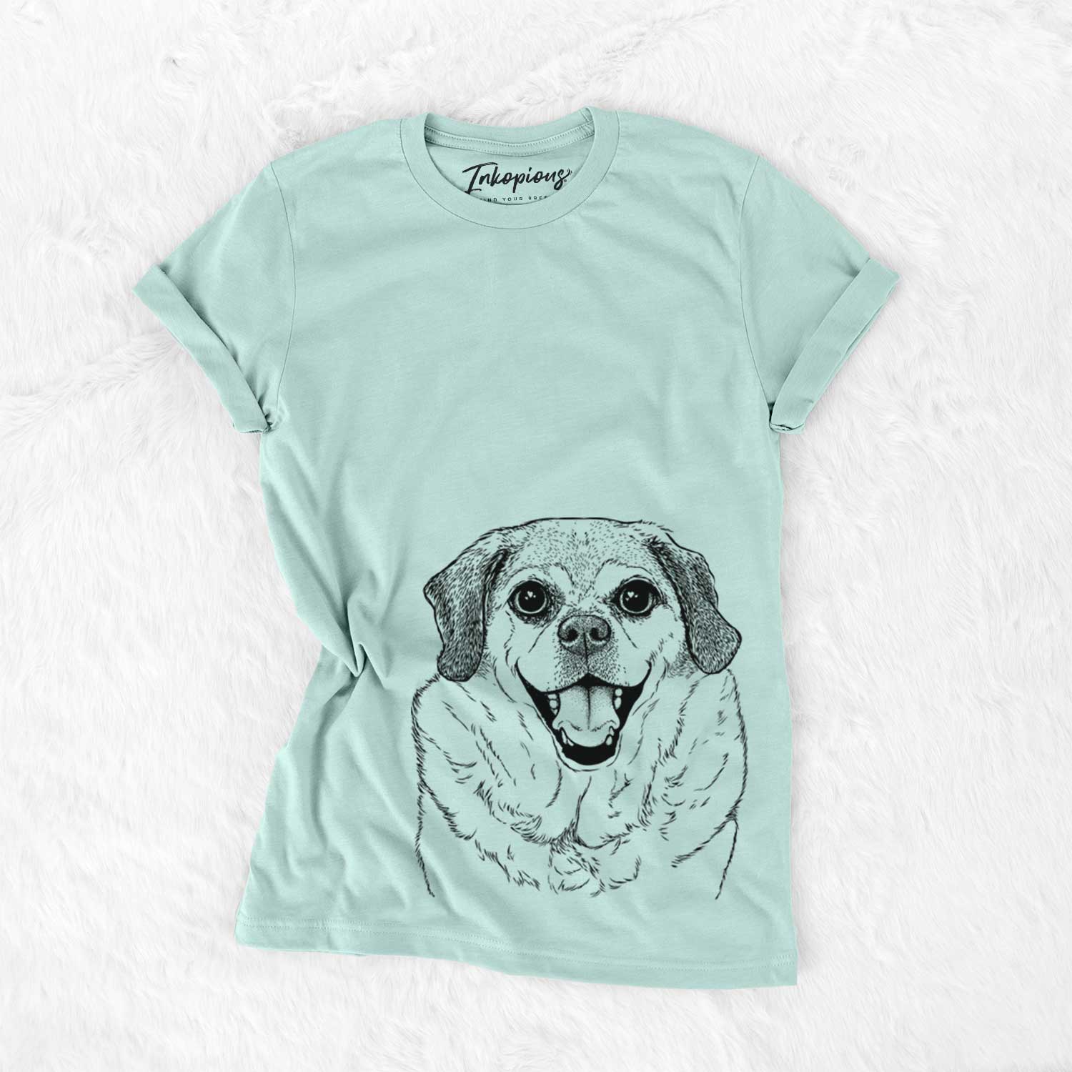 Hand-drawn sketch of LIttle Man the Puggle on a Heather Sage Bella Canvas Unisex Crewneck