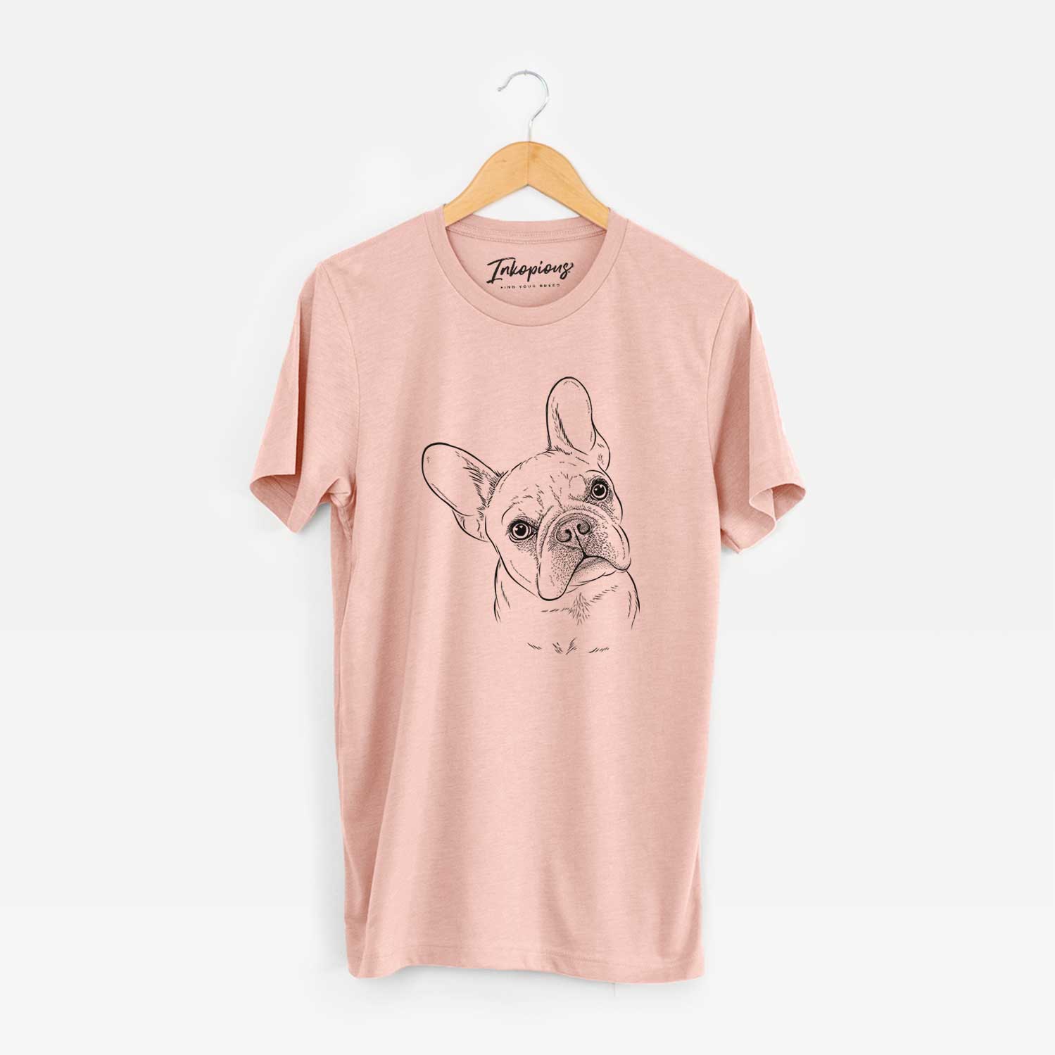 Hand-drawn sketch of Loki the French Bulldog on a Peach Unisex crewneck