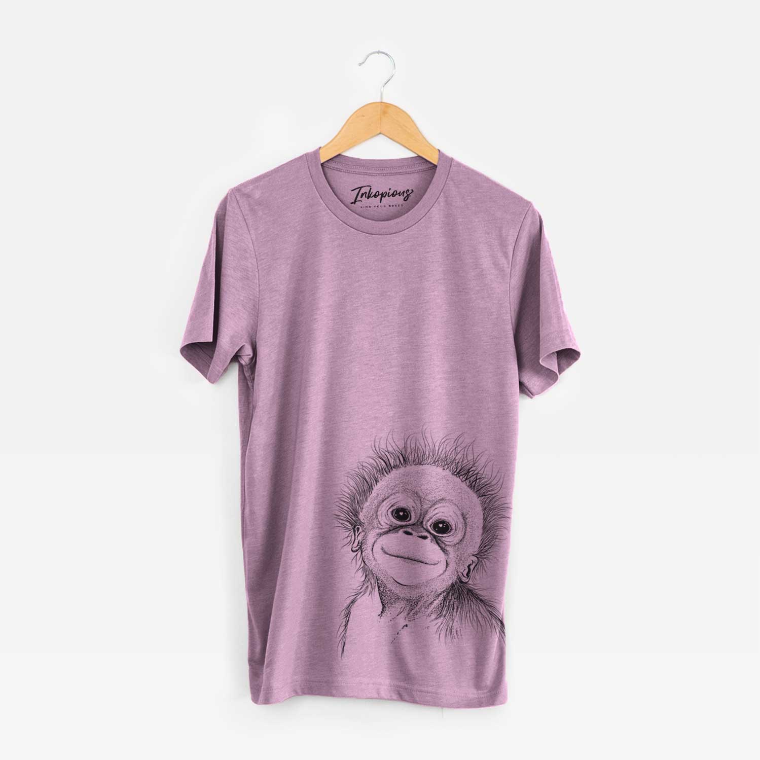 Hand-drawn sketch of Louie the Baby Orangutan on an Orchid Bella Canvas Unisex Crewneck