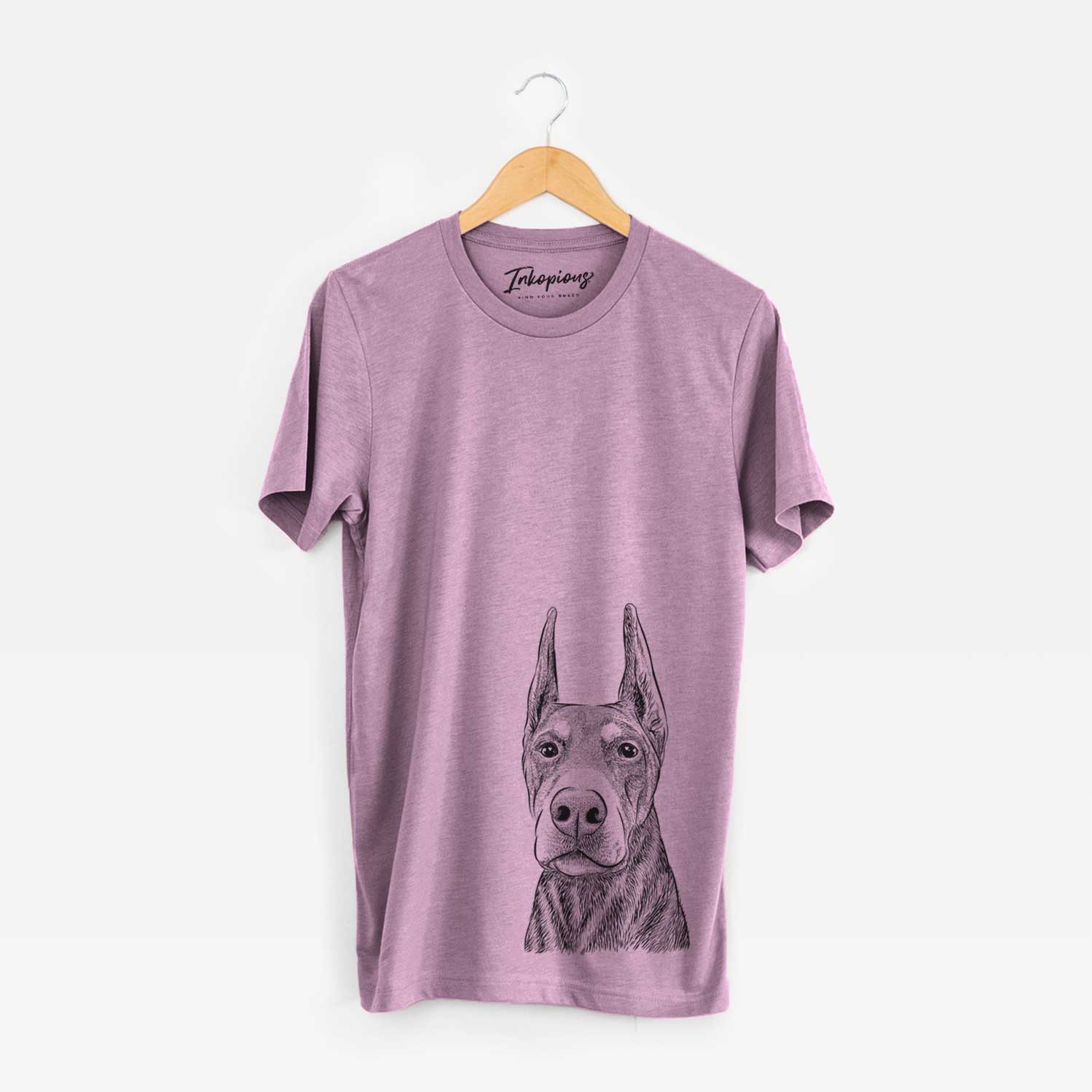 Hand-drawn sketch of Luna the Doberman Pinscher on an Orchid Unisex crewneck
