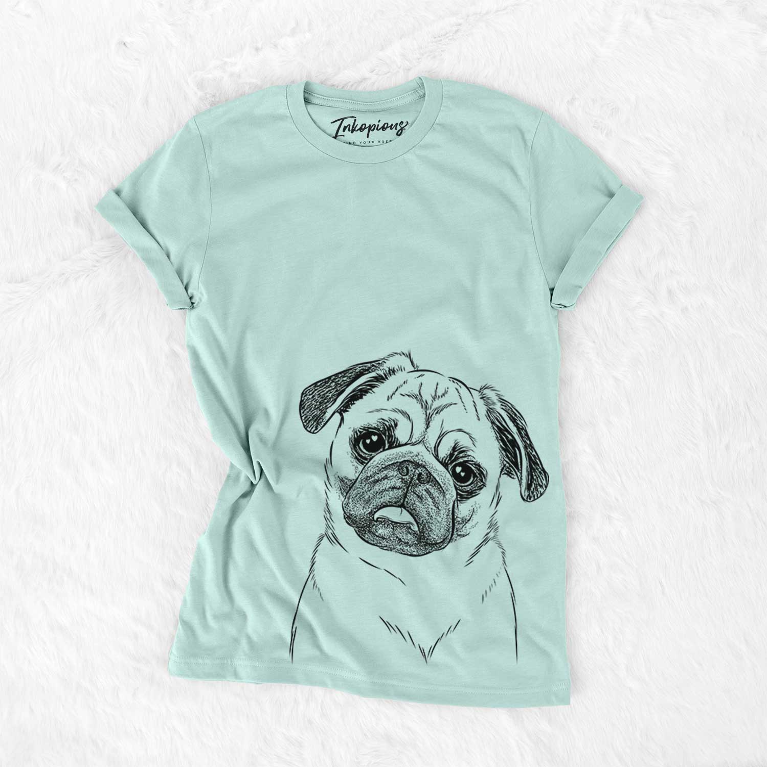 Hand-drawn sketch of Macy the Pug on a Heather Sage Bella Canvas Unisex Crewneck