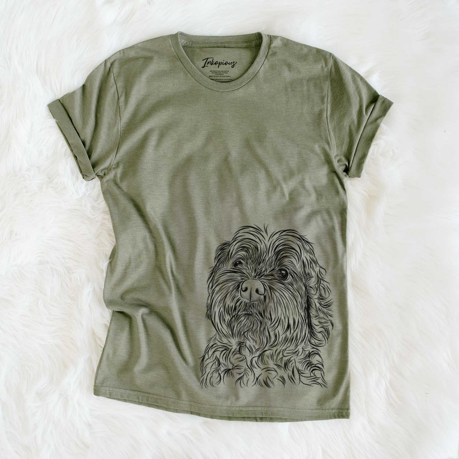 Hand-drawn sketch of Maggie Girl the Cockapoo on an Olive Unisex crewneck