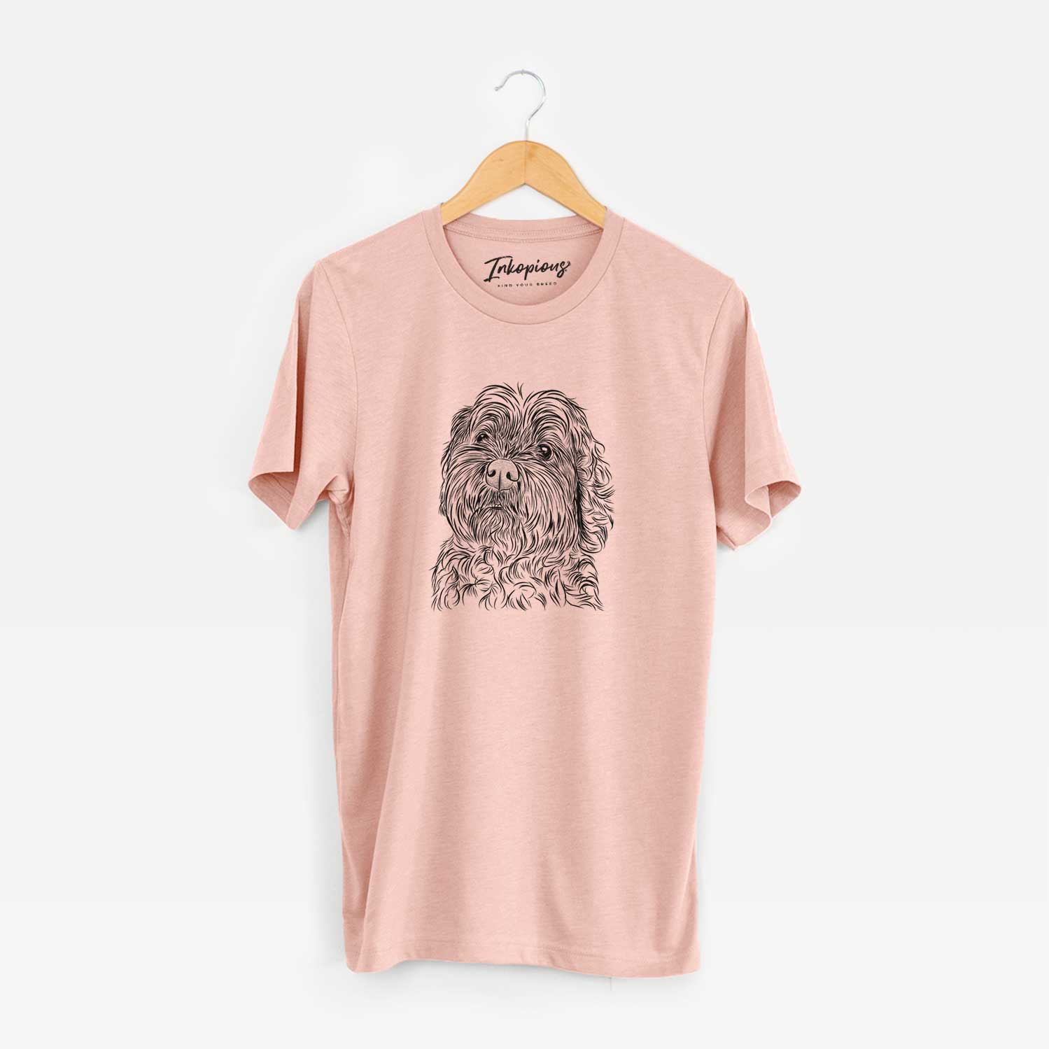 Hand-drawn sketch of Maggie Girl the Cockapoo on a Peach Unisex crewneck