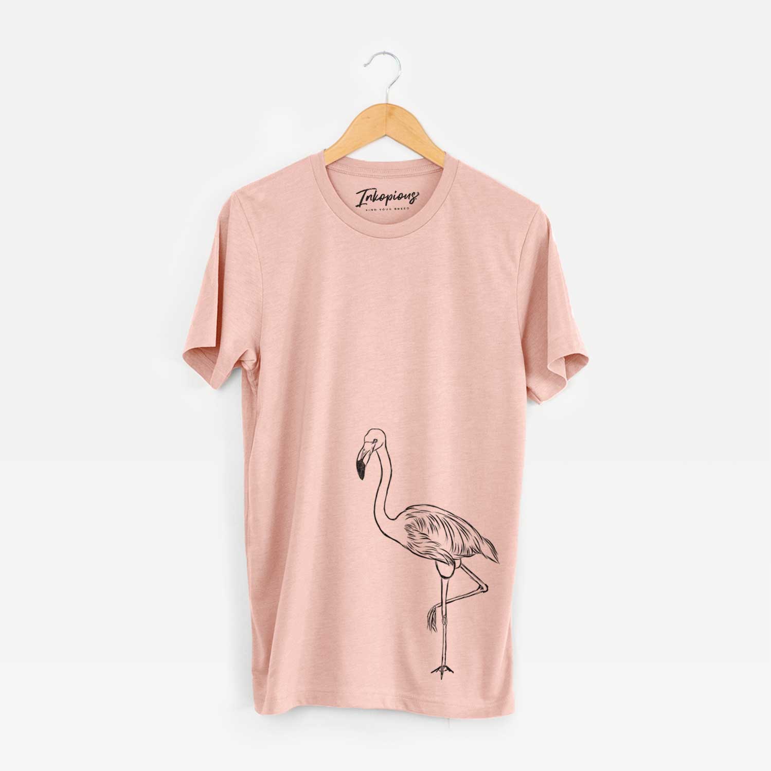 Hand-drawn sketch of Mango the Flamingo on a Peach Unisex crewneck