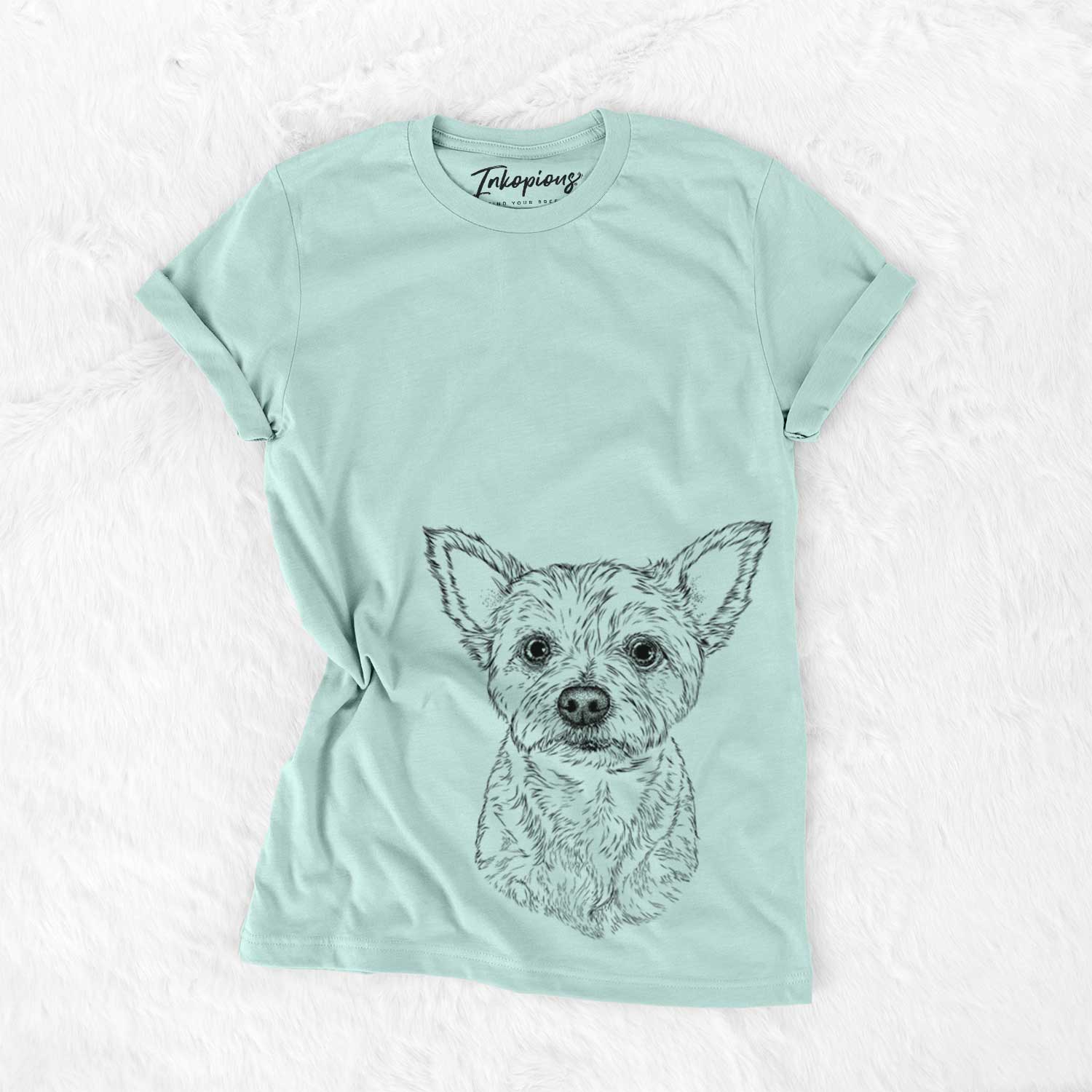 Hand-drawn sketch of Mango the Yorker Cairn Terrier Mix on a Heather Sage Unisex crewneck