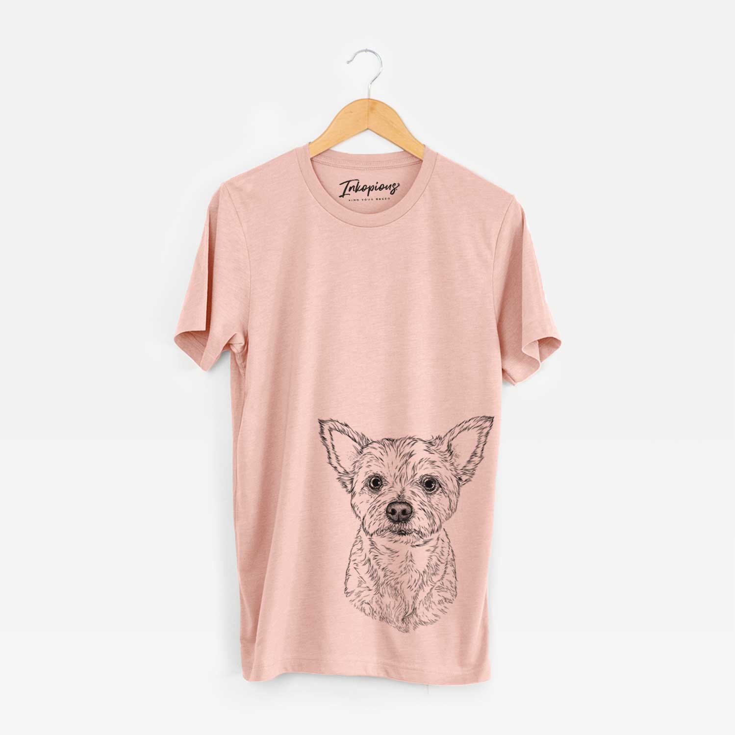 Hand-drawn sketch of Mango the Yorker Cairn Terrier Mix on a Peach Unisex crewneck
