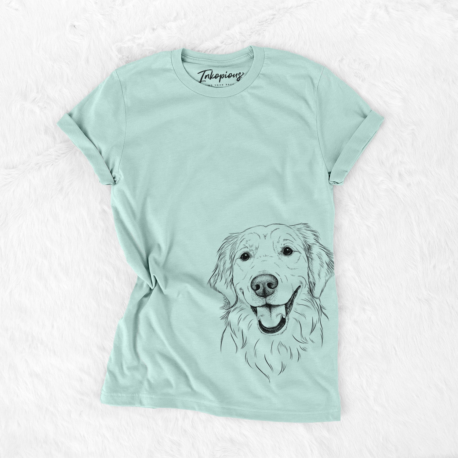 Hand-drawn sketch of Maple the Golden Retriever on a Heather Sage Unisex crewneck