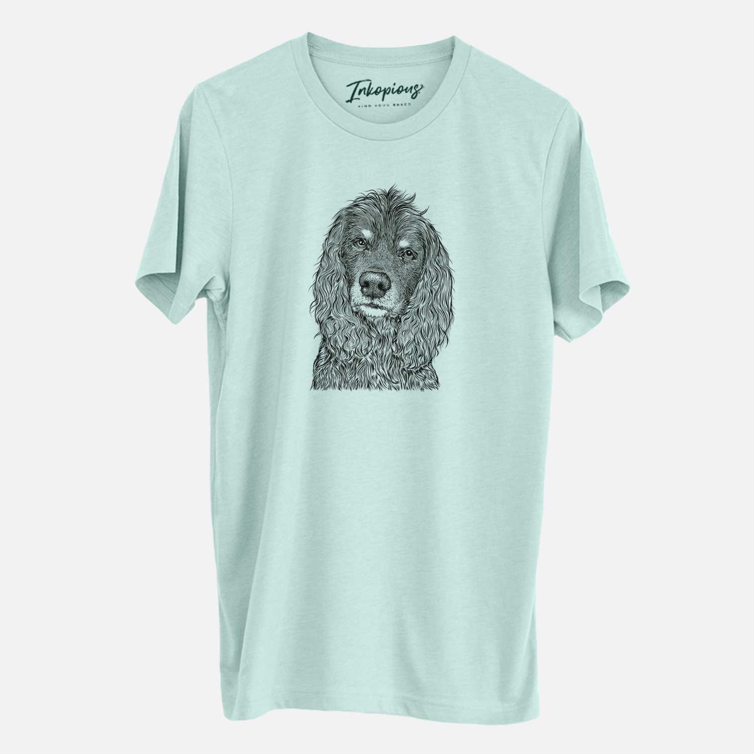 Hand-drawn sketch of Marley Boy the American Cocker Spaniel on a Heather Sage Unisex crewneck