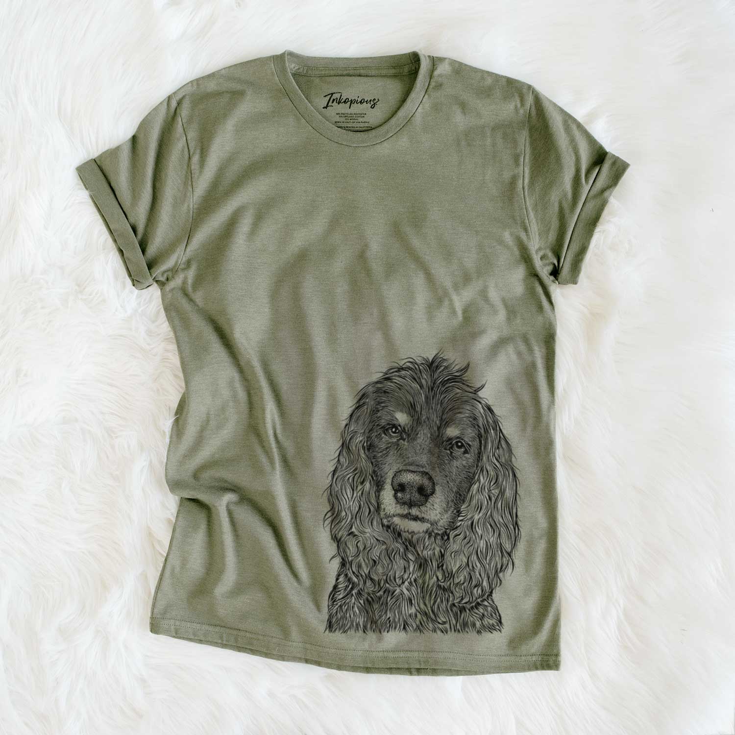 Hand-drawn sketch of Marley Boy the American Cocker Spaniel on an Olive Unisex crewneck