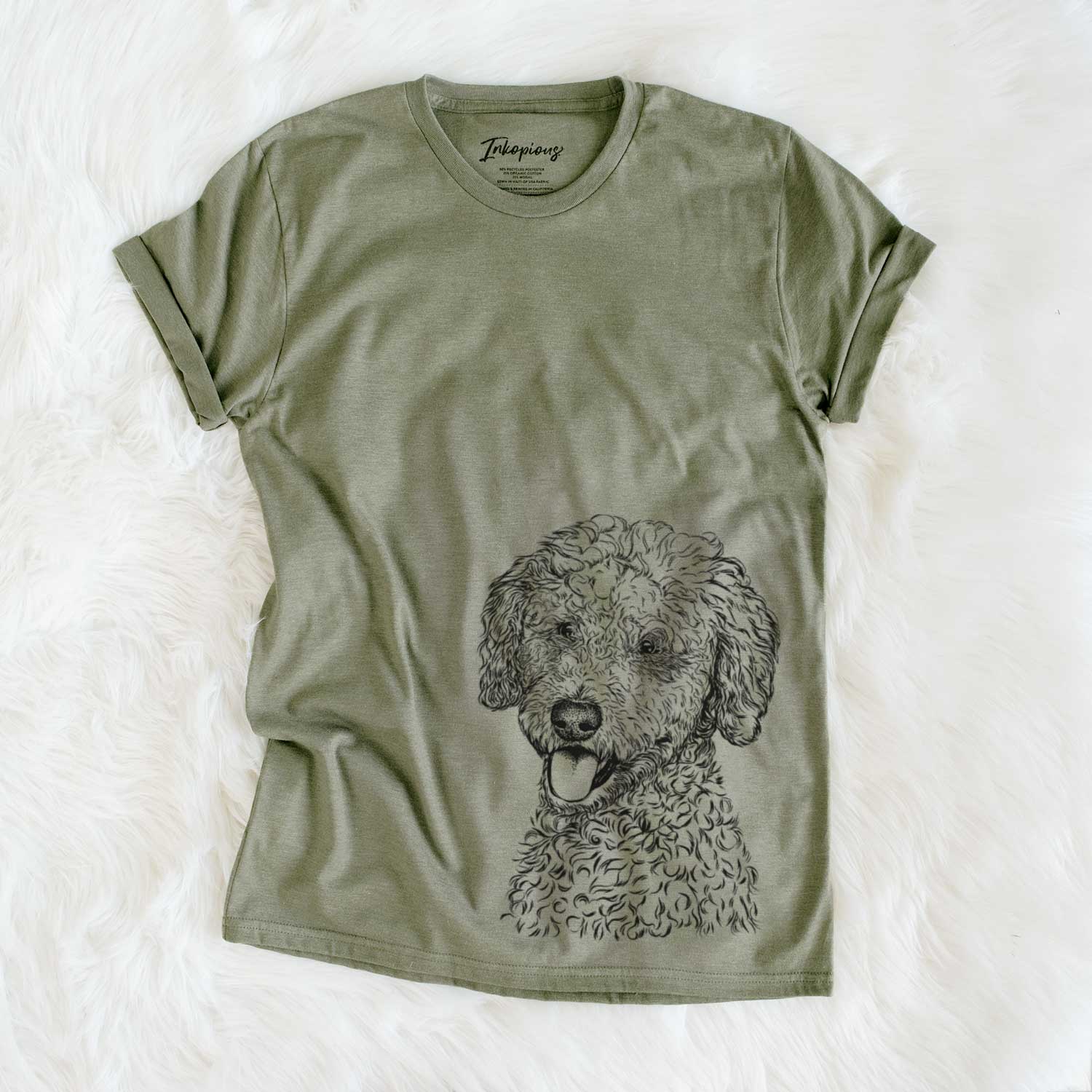 Hand-drawn sketch of Marlow the Goldendoodle on an Olive Unisex crewneck