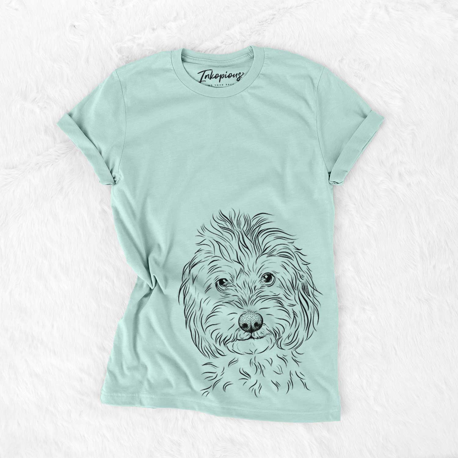 Hand-drawn sketch of Mason the Cavapoo on a Heather Sage Bella Canvas Unisex Crewneck