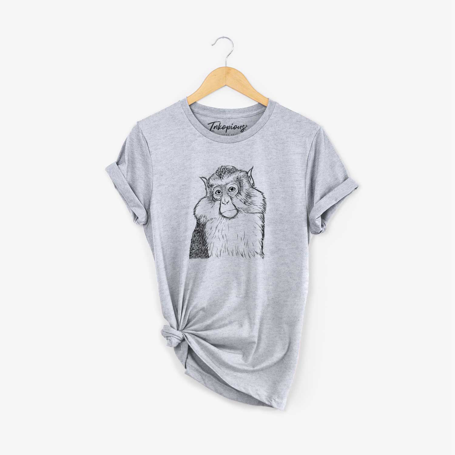 Hand-drawn sketch of Matata the Mona Monkey on a Grey Unisex crewneck