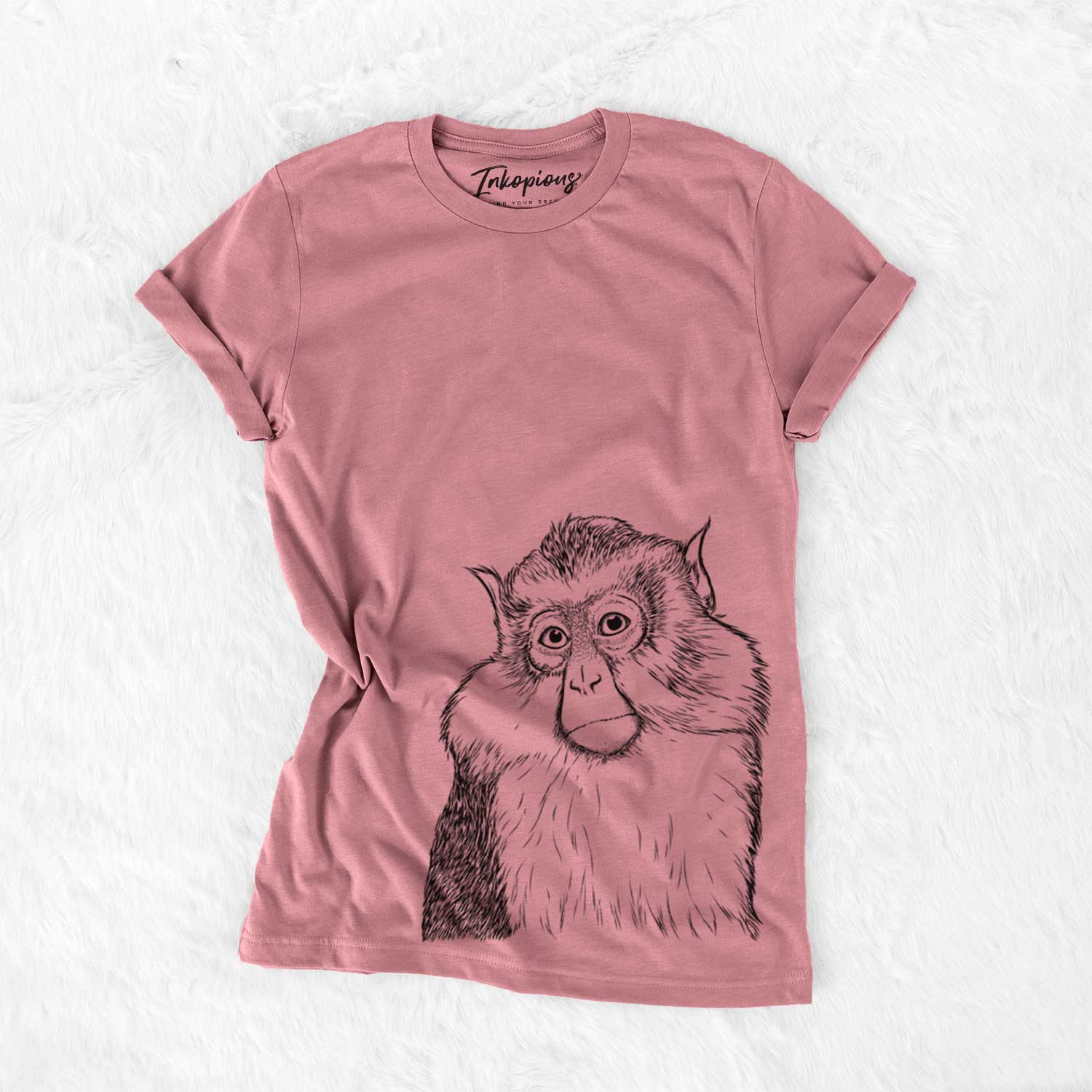 Hand-drawn sketch of Matata the Mona Monkey on a Mauve Unisex crewneck
