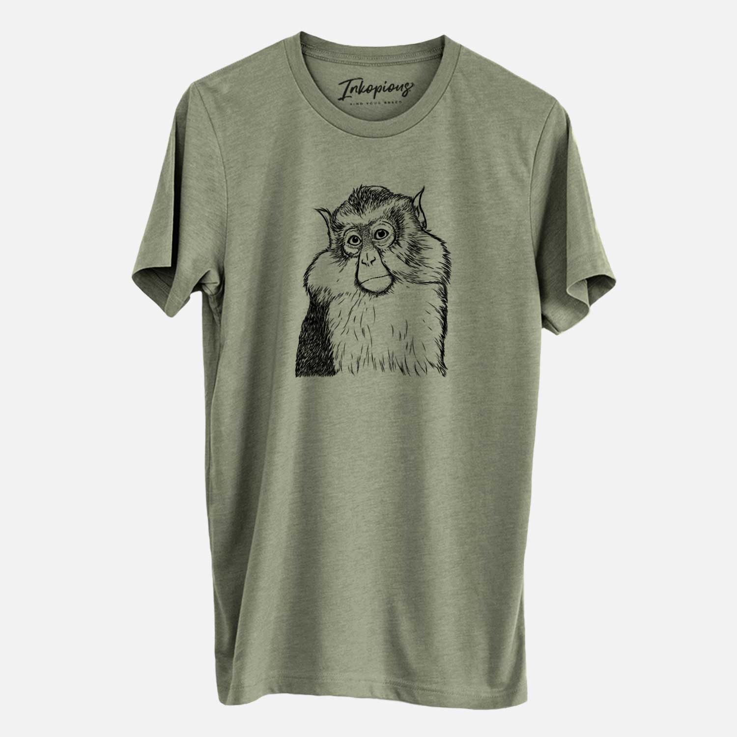 Hand-drawn sketch of Matata the Mona Monkey on an Olive Unisex crewneck