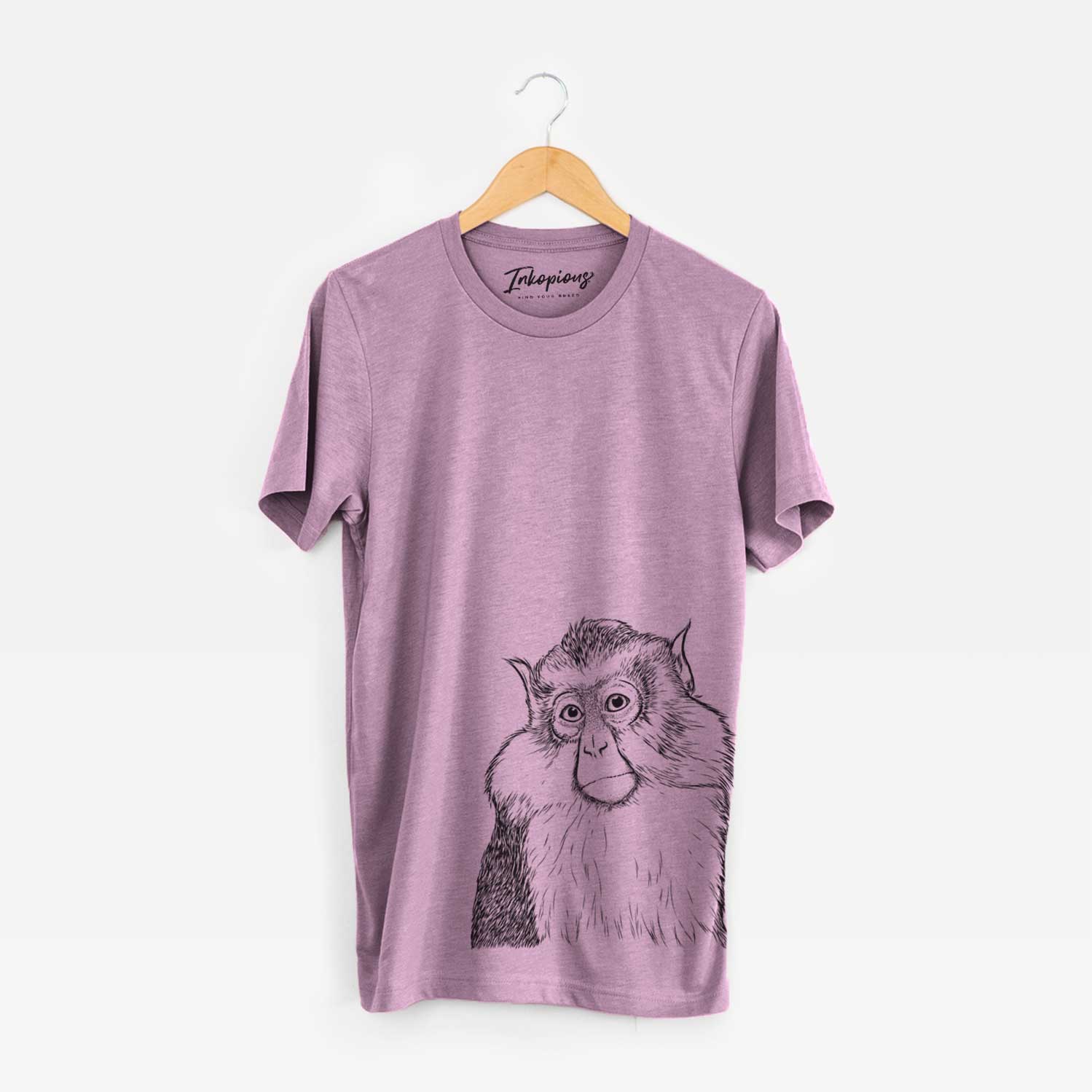 Hand-drawn sketch of Matata the Mona Monkey on an Orchid Unisex crewneck