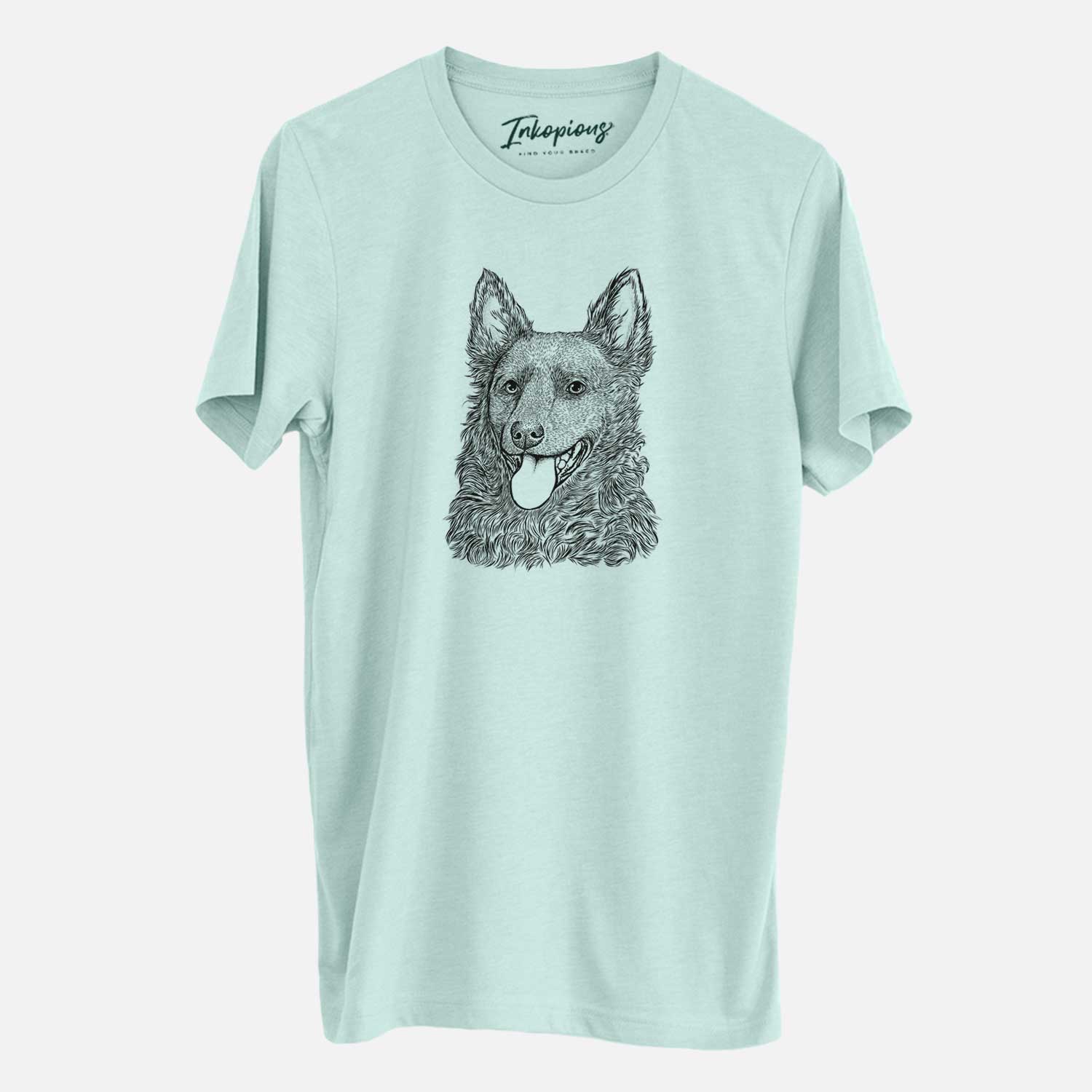 Hand-drawn sketch of Maximo the Mudi on a Heather Sage Unisex crewneck