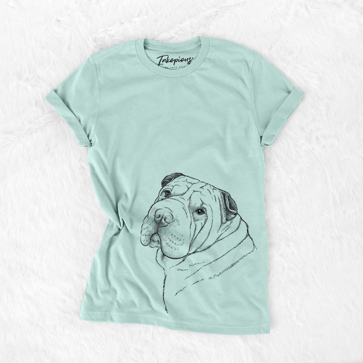Hand-drawn sketch of Maximus the Shar Pei on a Heather Sage Unisex crewneck
