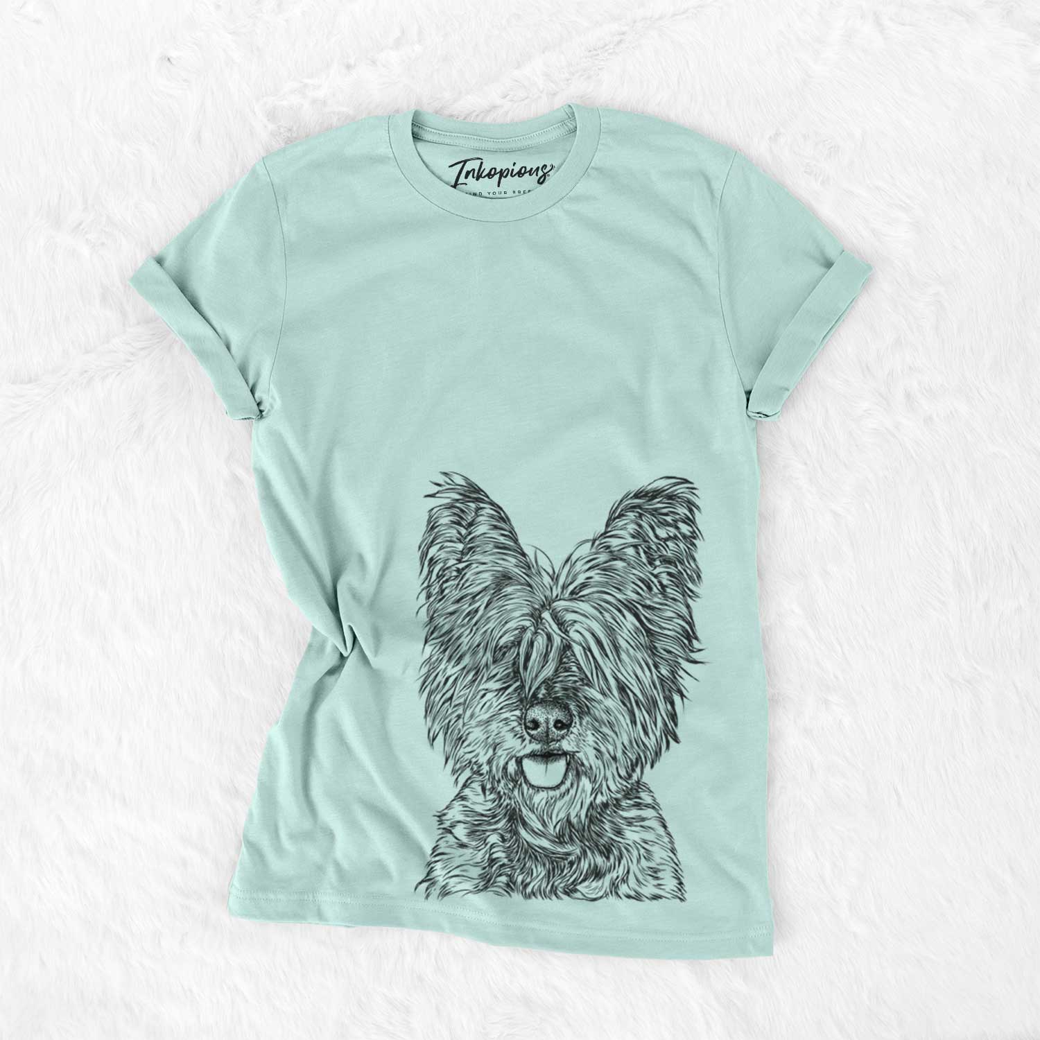 Hand-drawn sketch of McDuff the Cairn Terrier on a Heather Sage Bella Canvas Unisex Crewneck