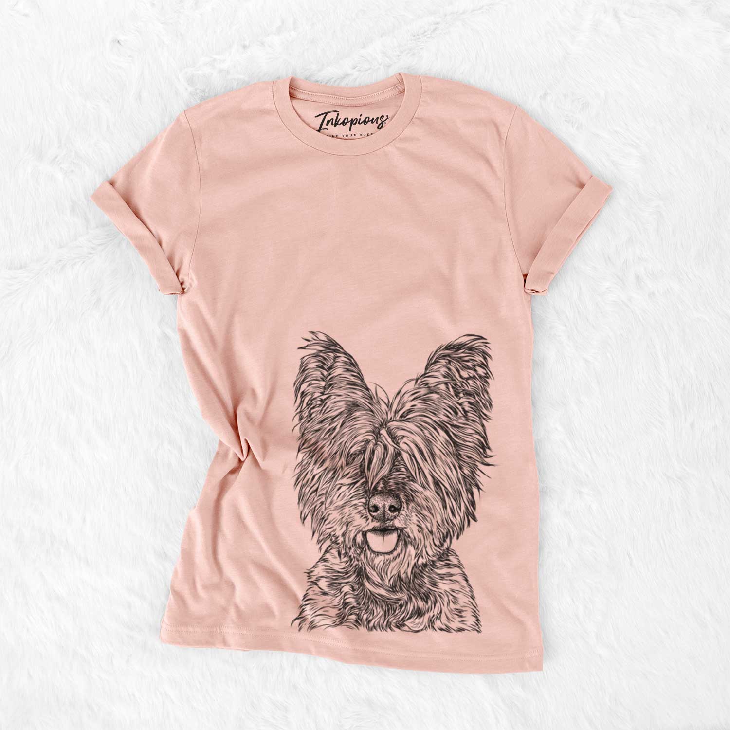Hand-drawn sketch of McDuff the Cairn Terrier on a Peach Bella Canvas Unisex Crewneck