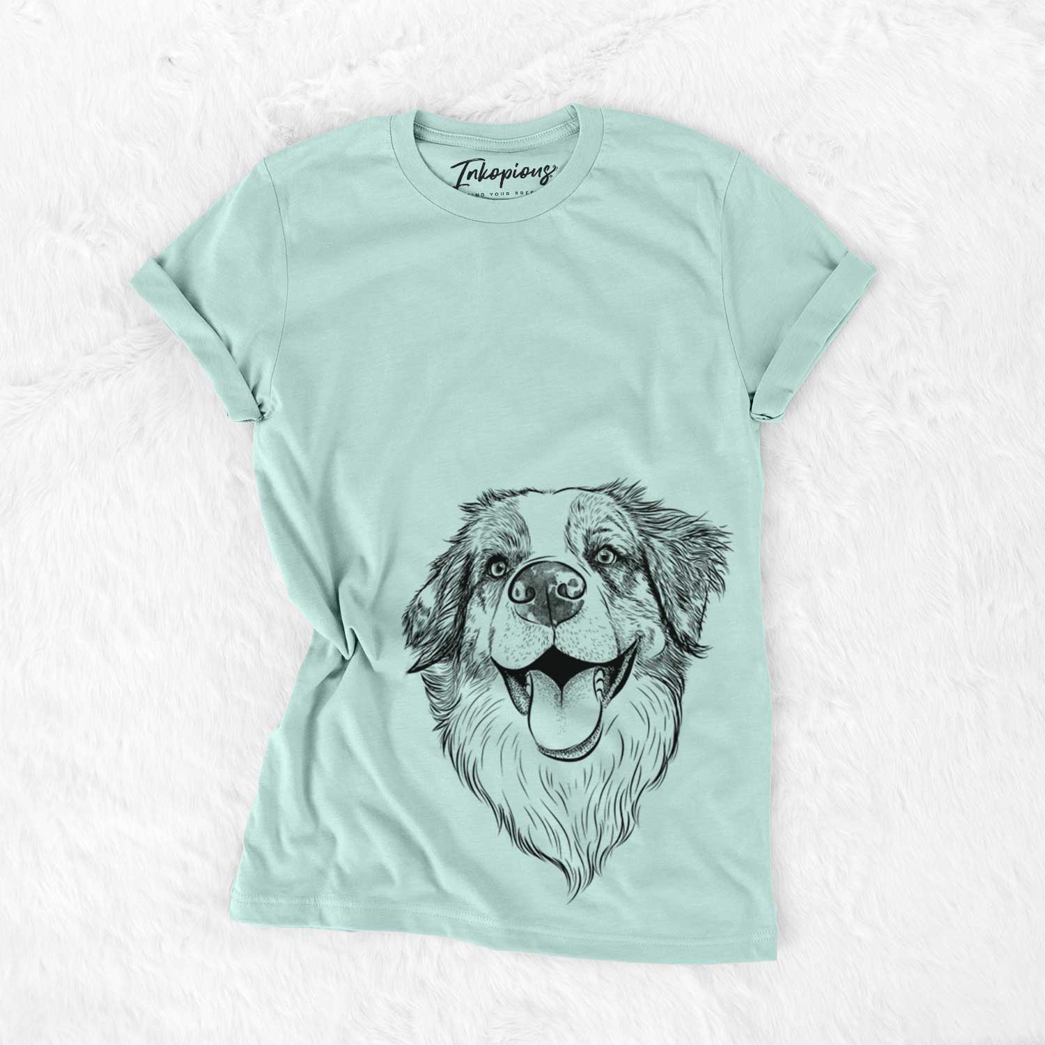Hand-drawn sketch of Mila the Australian Shepherd on a Heather Sage Unisex crewneck