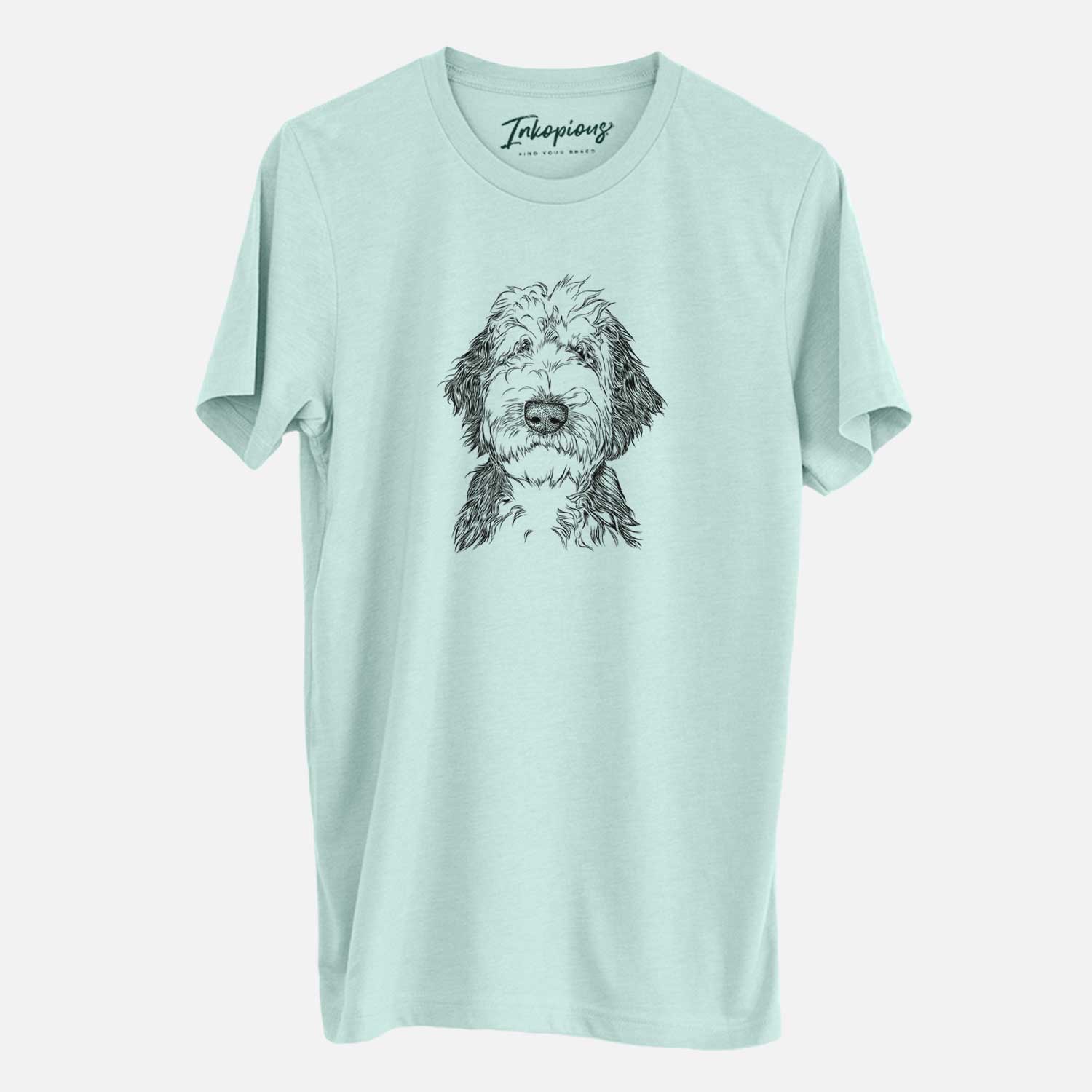 Hand-drawn sketch of Milo Fluff the Sheepadoodle on a Heather Sage Unisex crewneck
