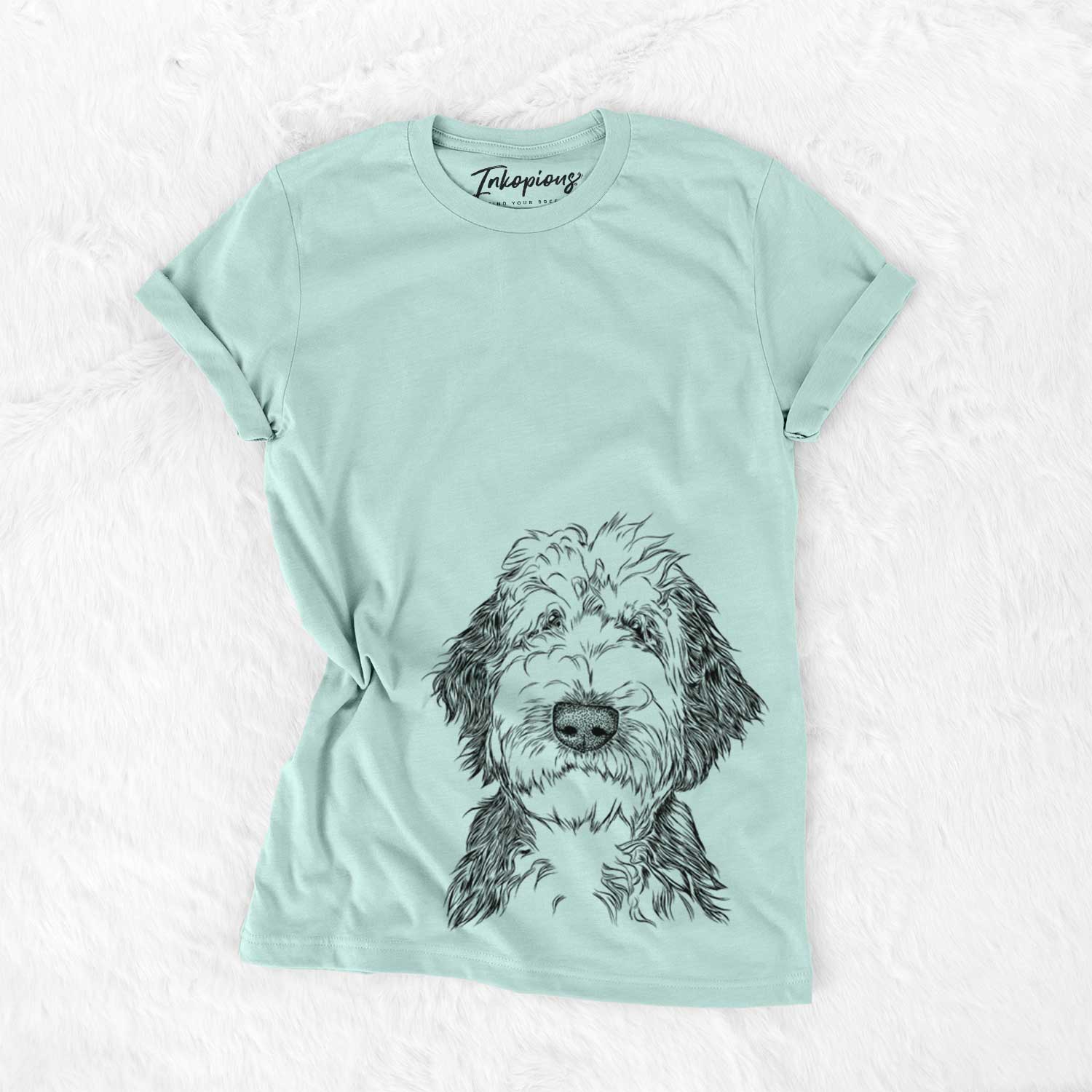 Hand-drawn sketch of Milo Fluff the Sheepadoodle on a Heather Sage Unisex crewneck