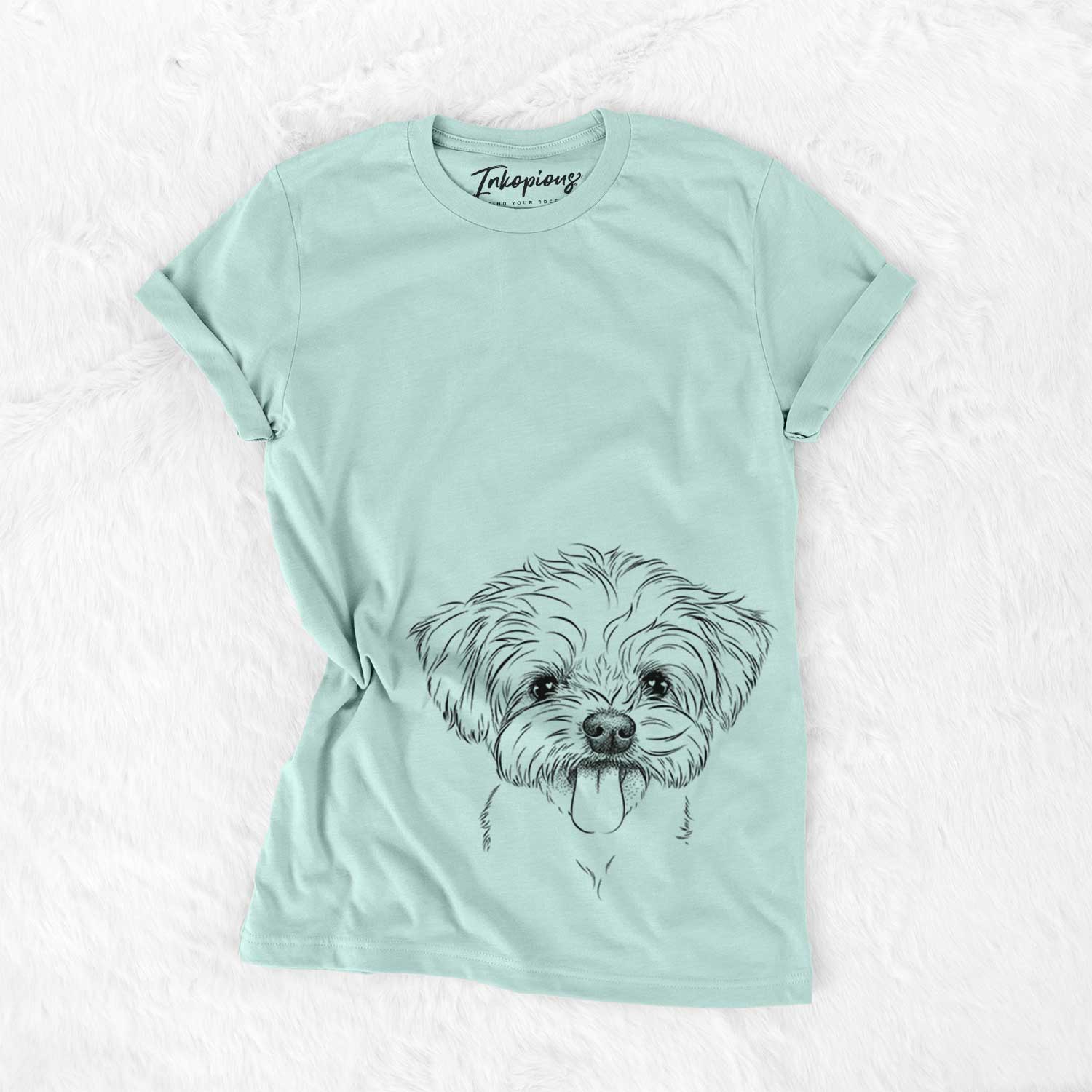Hand-drawn sketch of Mochi the Maltese on a Heather Sage Unisex crewneck