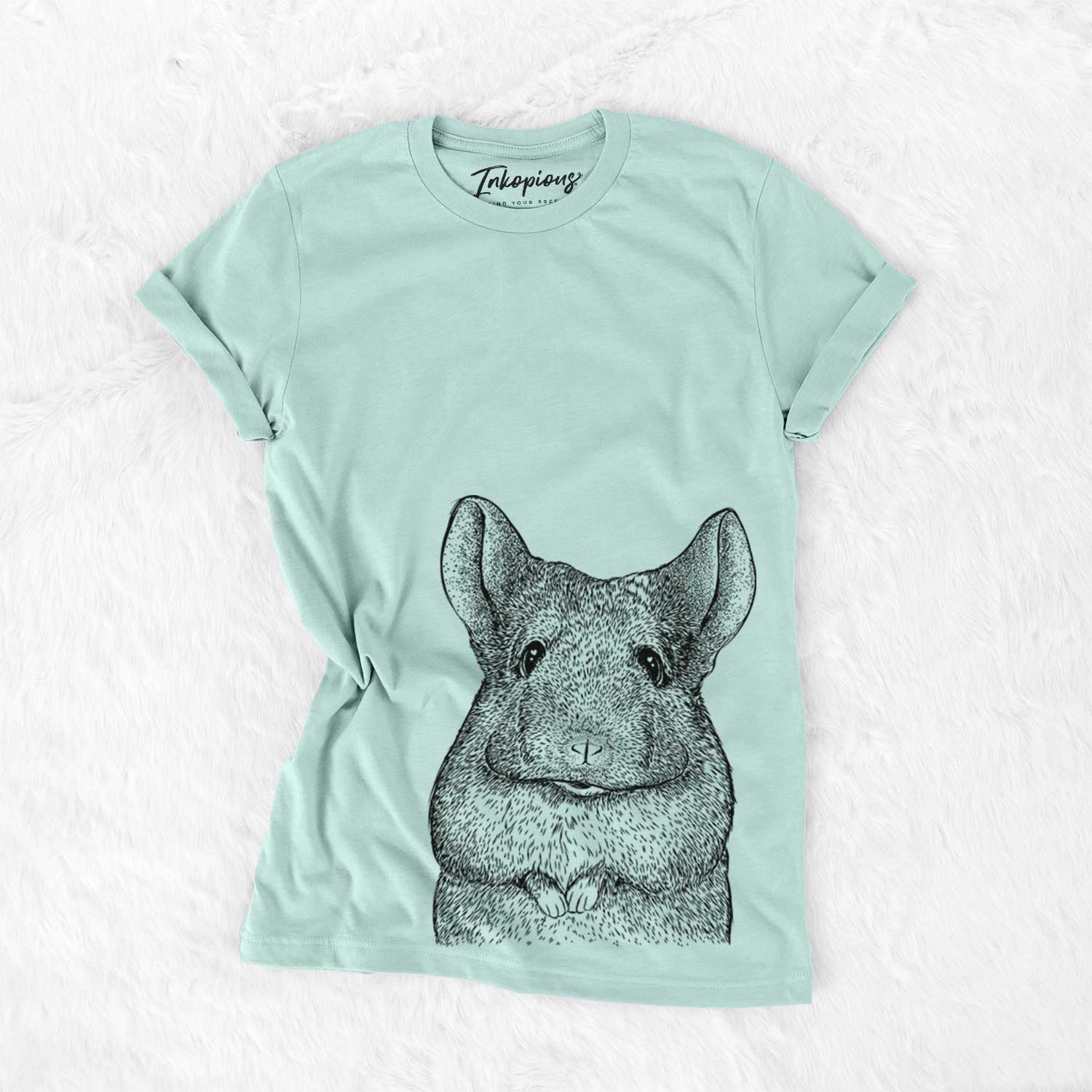 Hand-drawn sketch of Mojo the Chinchilla on a Heather Sage Bella Canvas Unisex Crewneck