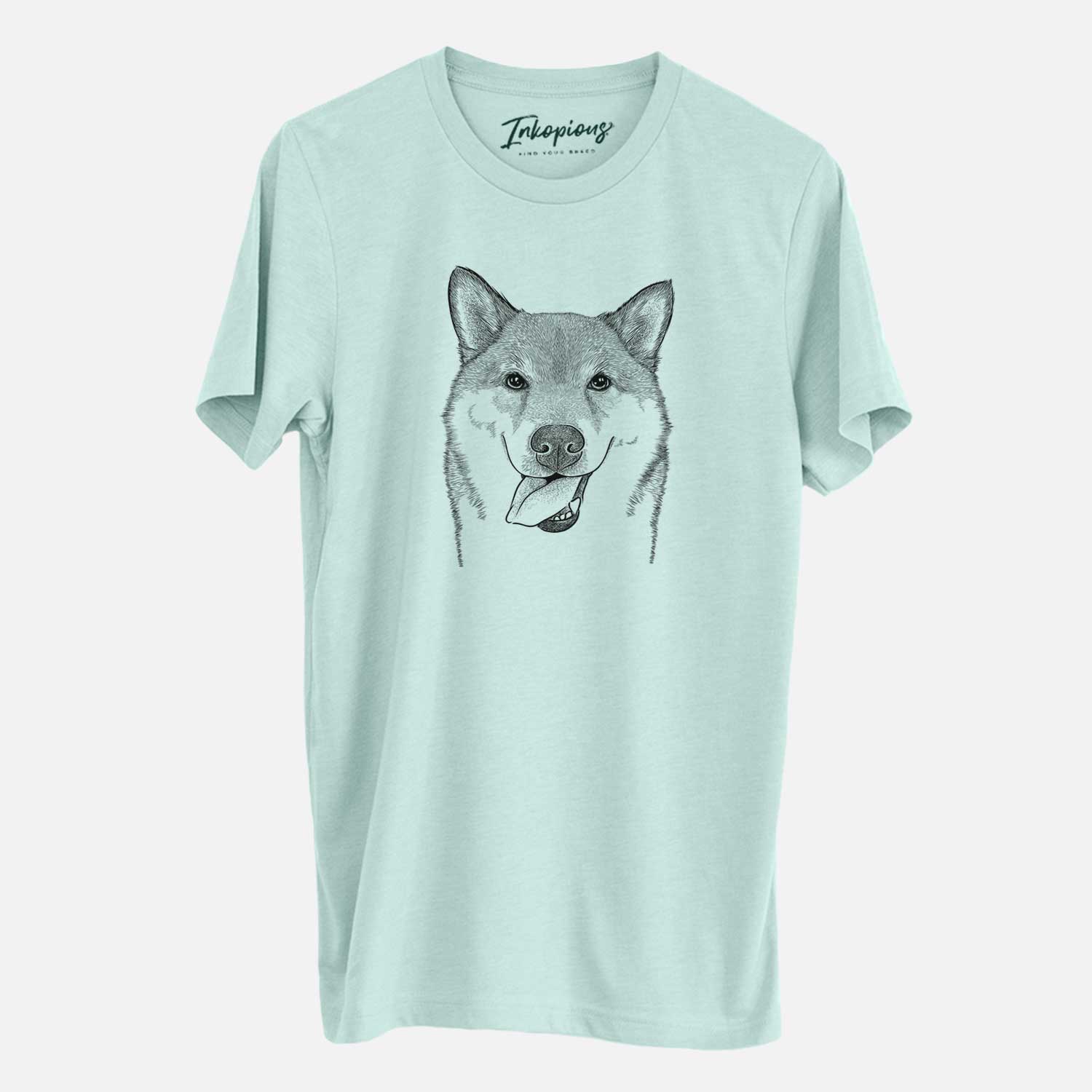 Hand-drawn sketch of Mothra the Shiba Inu on a Heather Sage Unisex crewneck
