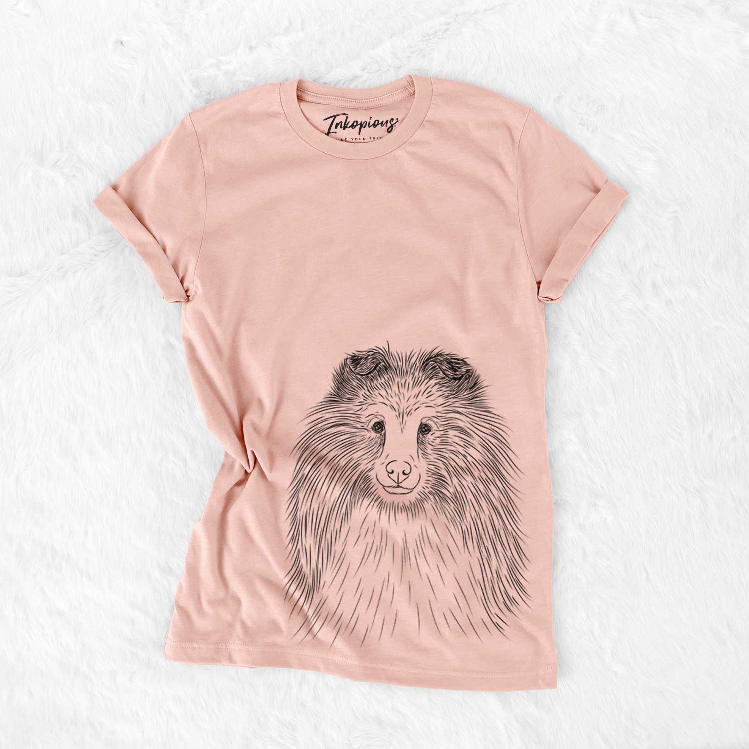 Hand-drawn sketch of Moxie the Shetland Sheepdog on a Peach Bella Canvas Unisex Crewneck