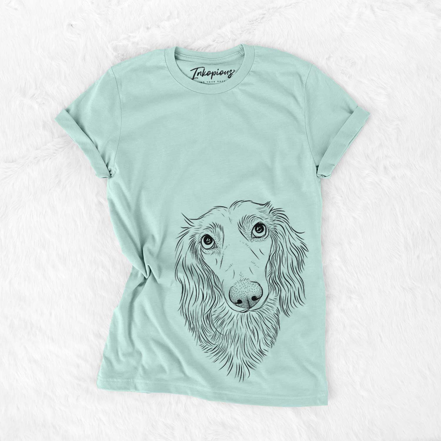 Hand-drawn sketch of Mr. Rusty the Long Haired Dachshund on a Heather Sage Bella Canvas Unisex Crewneck