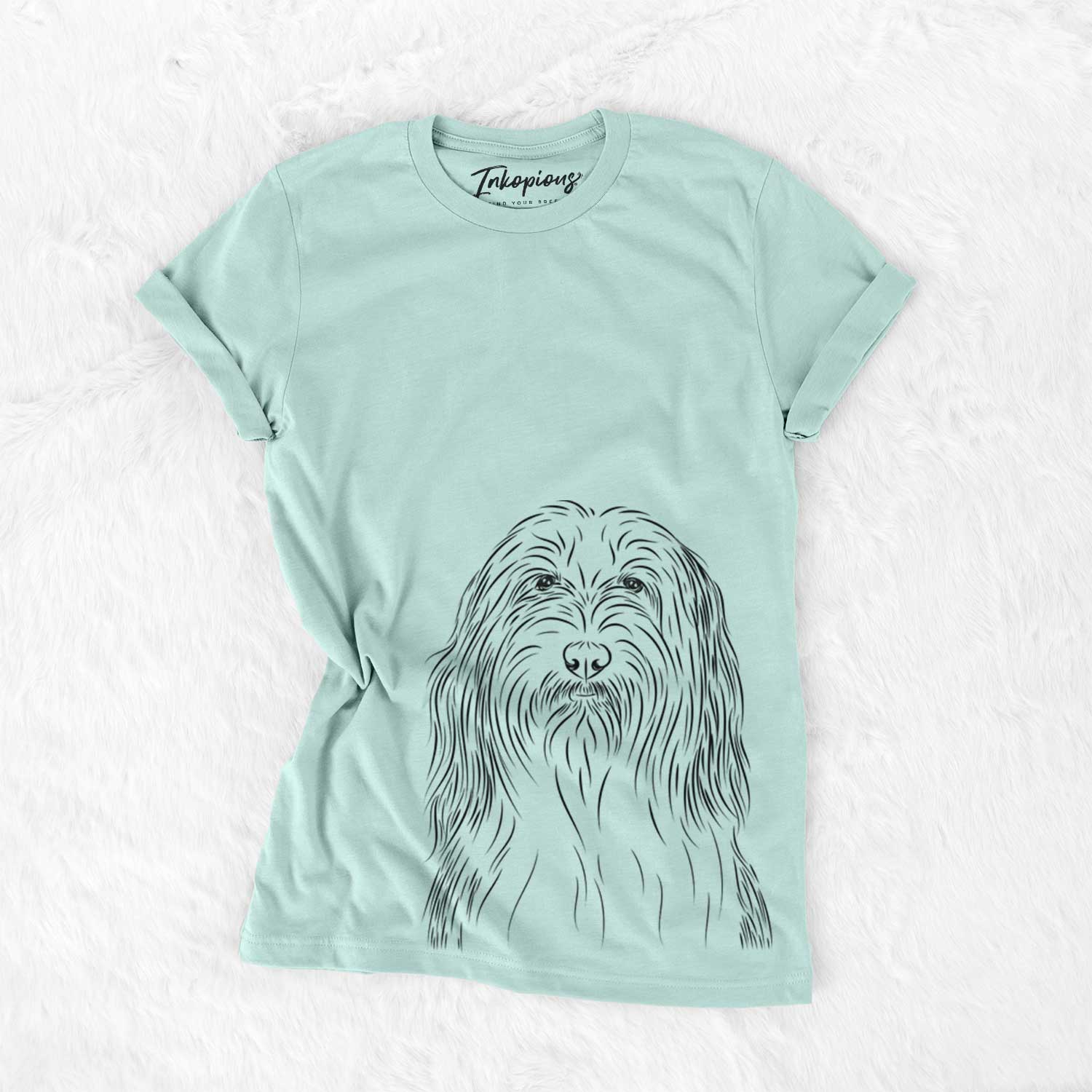 Hand-drawn sketch of Murray the Bearded Collie on a Heather Sage Unisex crewneck
