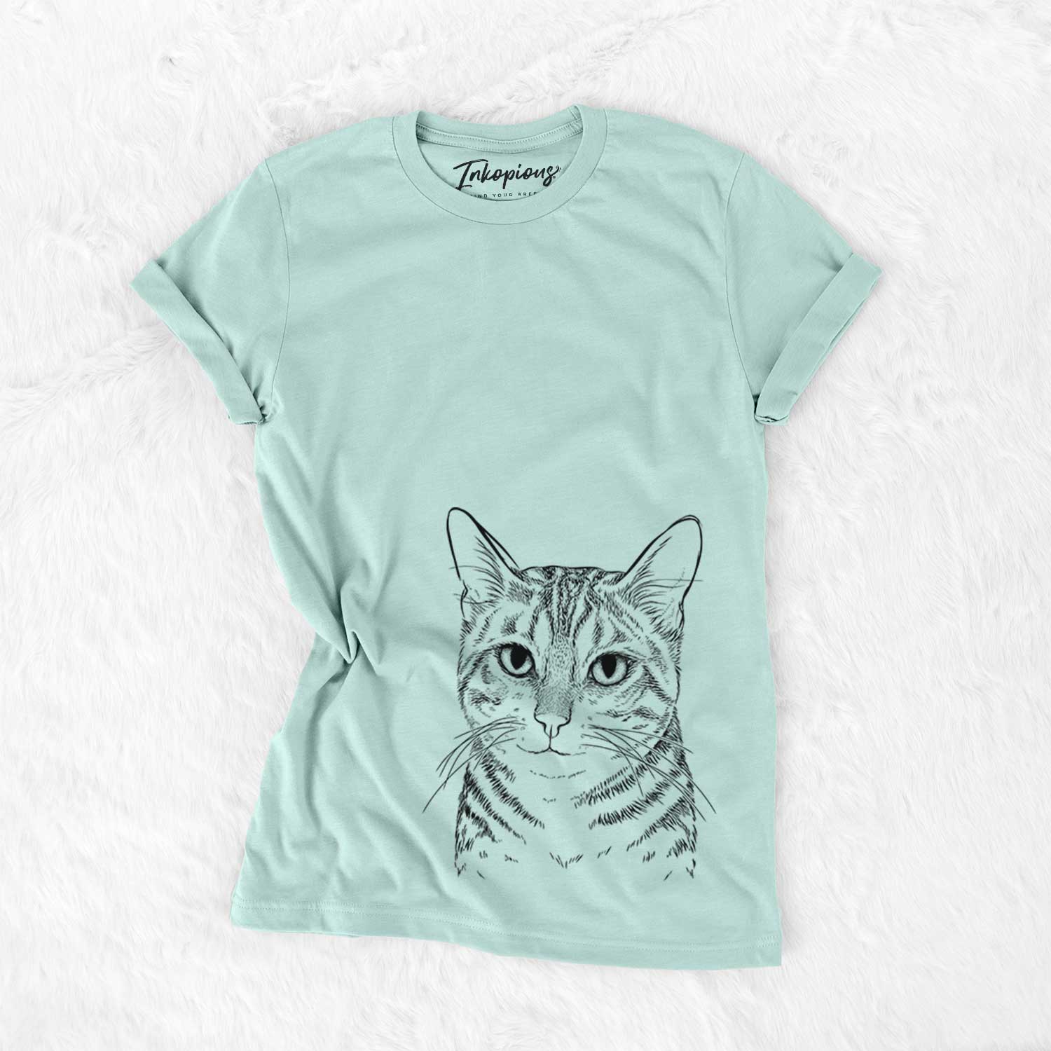 Hand-drawn sketch of Nell the Tabby Cat on a Heather Sage Unisex crewneck
