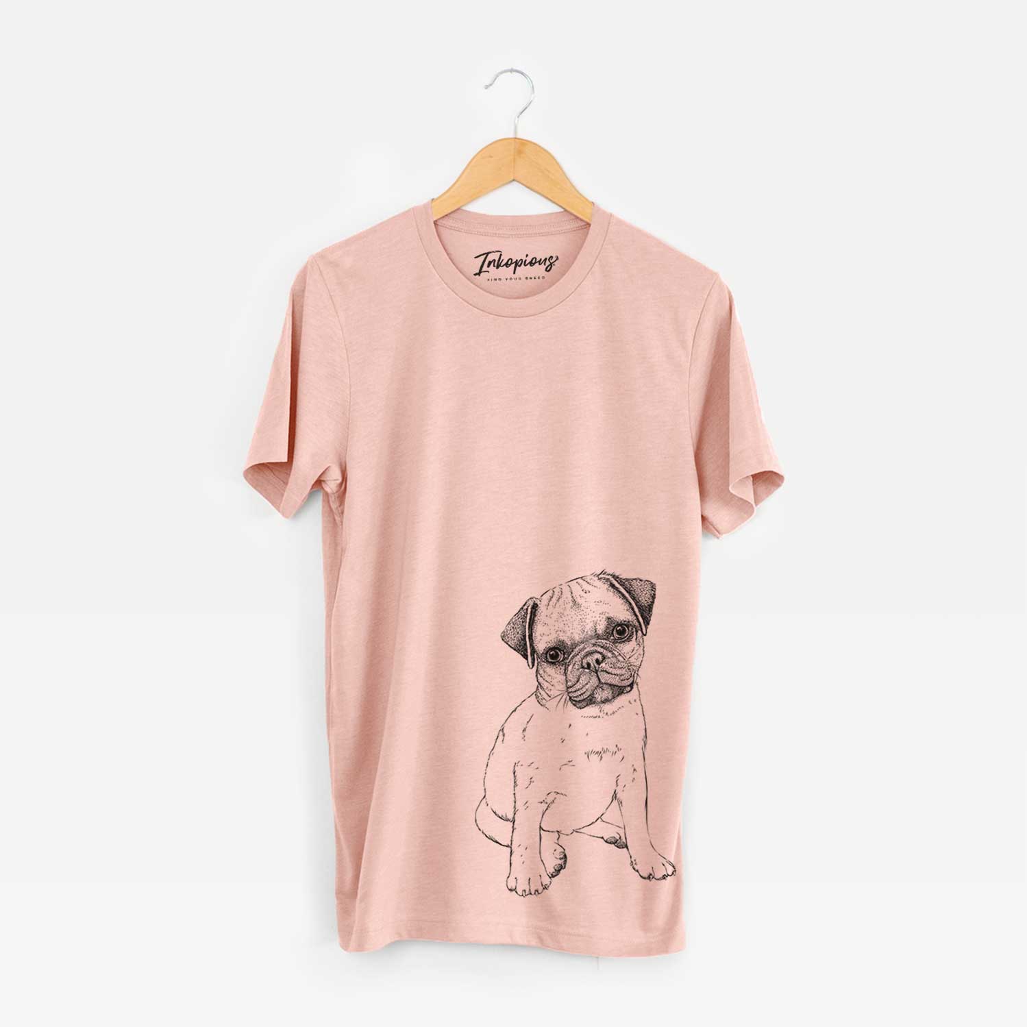 Hand-drawn sketch of Nelson the Pug Puppy on a Peach Bella Canvas Unisex Crewneck