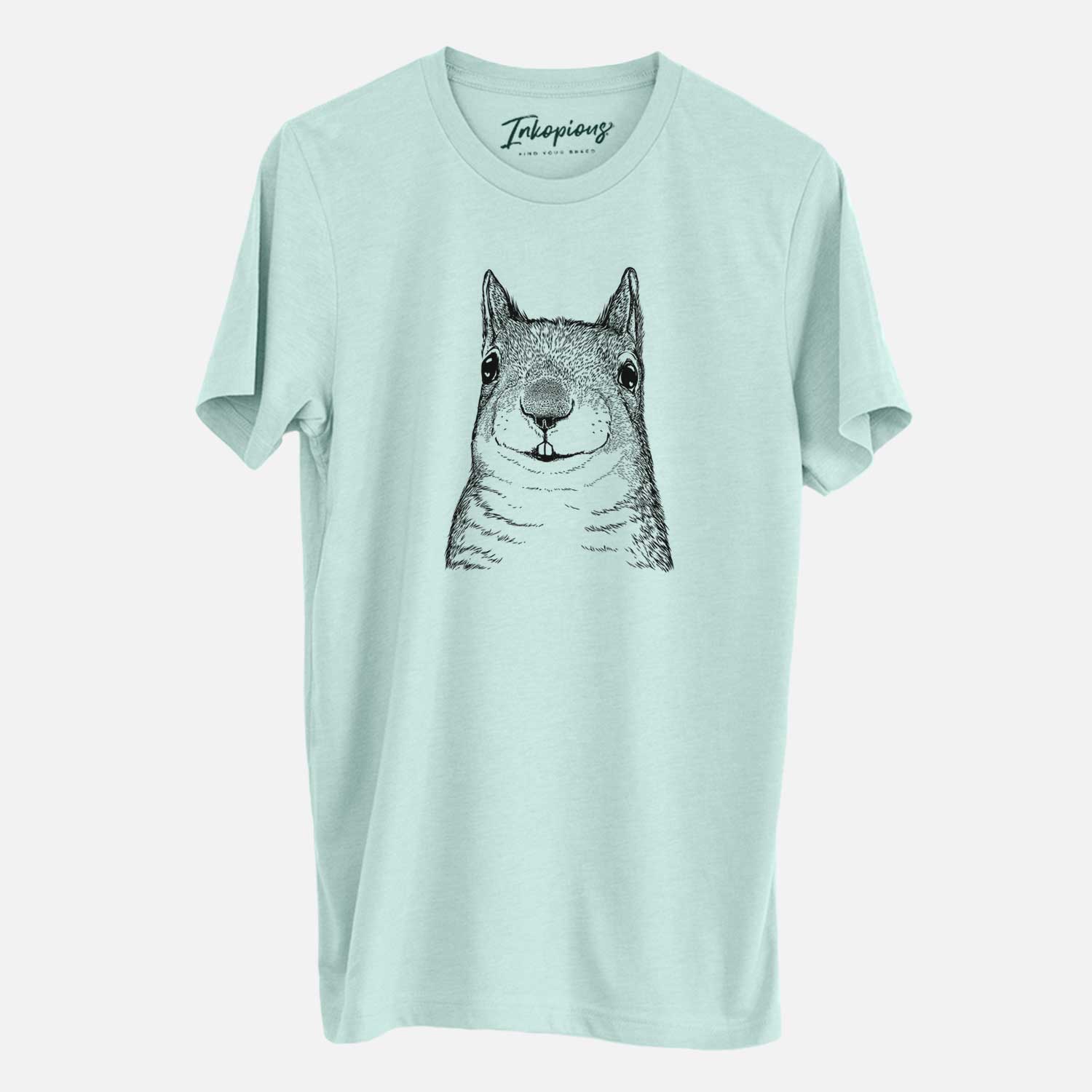 Hand-drawn sketch of Nibbles the Squirrel on a Heather Sage Unisex crewneck