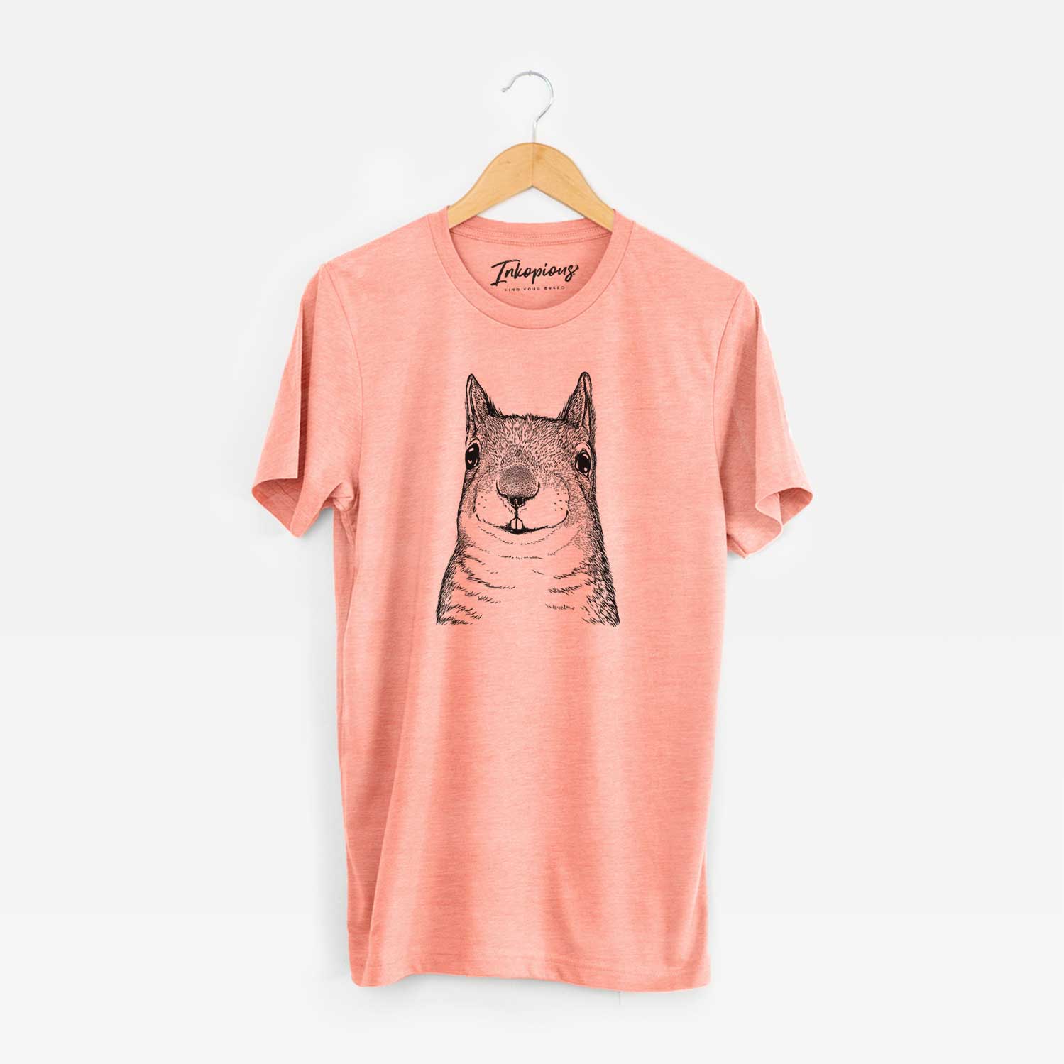 Hand-drawn sketch of Nibbles the Squirrel on a Sunset Unisex crewneck