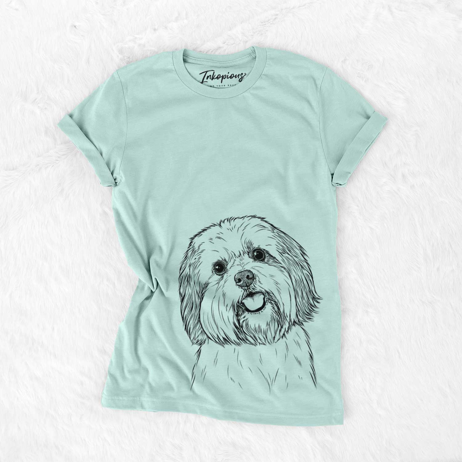 Hand-drawn sketch of Nikka the Lowchen on a Heather Sage Bella Canvas Unisex Crewneck