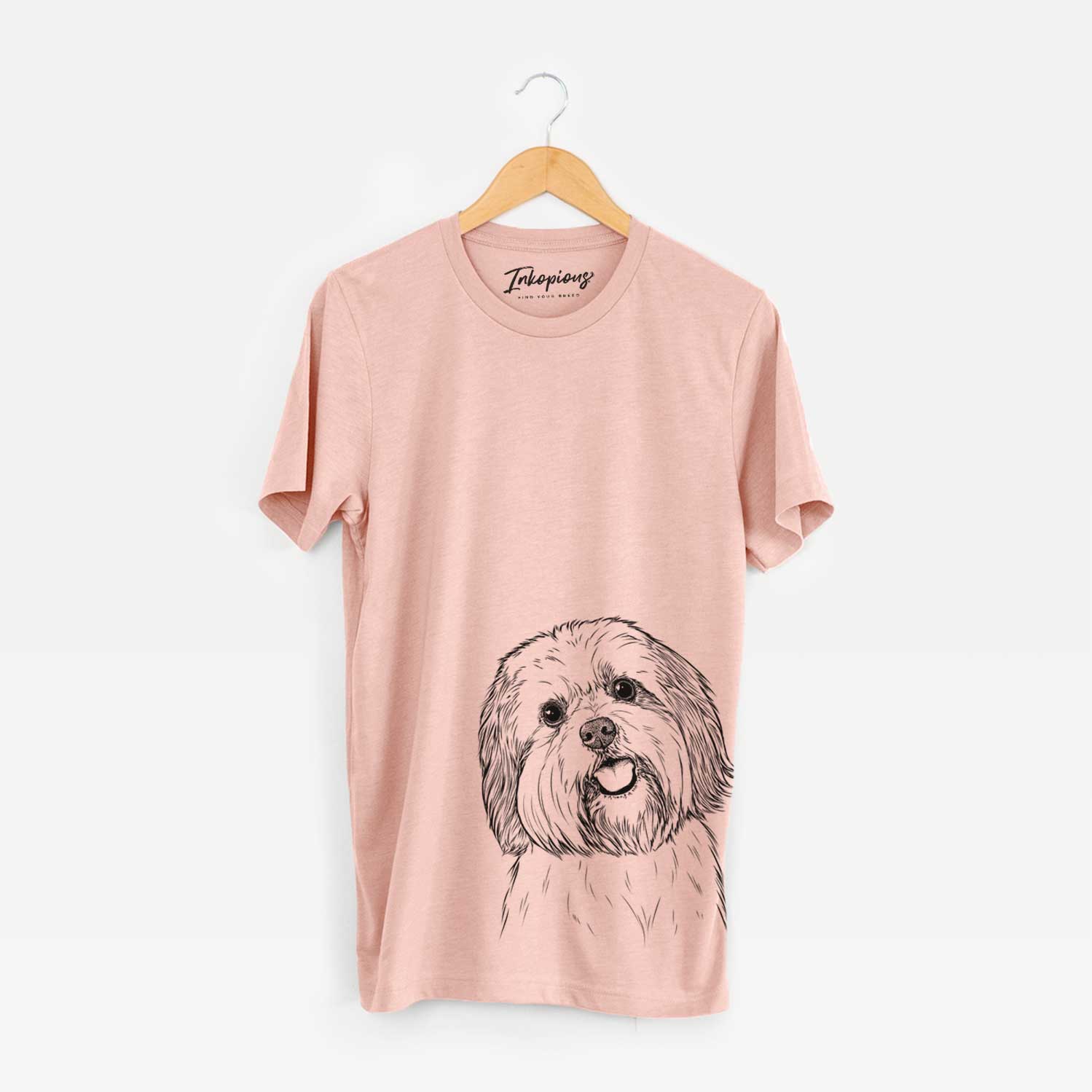 Hand-drawn sketch of Nikka the Lowchen on a Peach Bella Canvas Unisex Crewneck