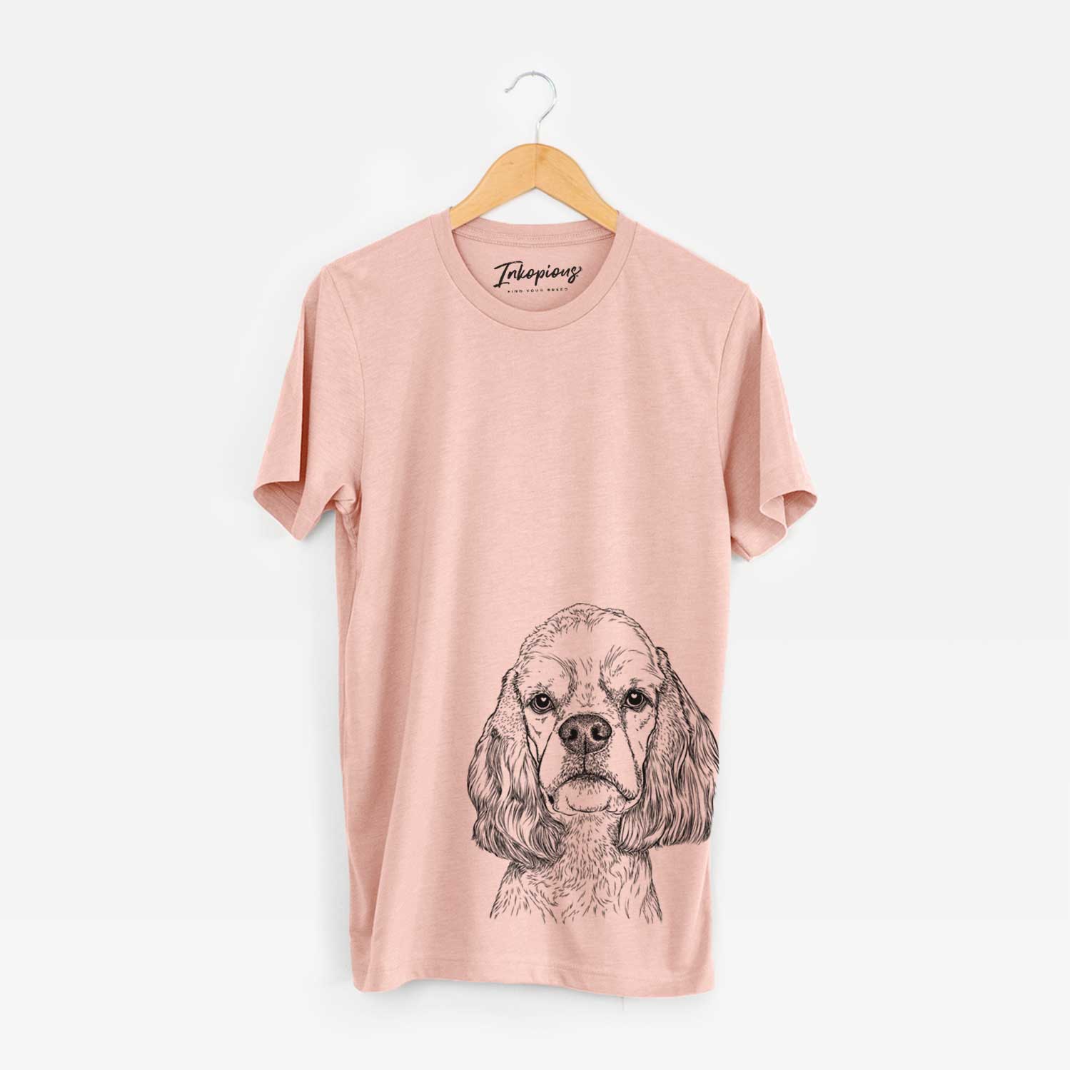 Hand-drawn sketch of Oakley the American Cocker Spaniel on a Peach Bella Canvas Unisex Crewneck