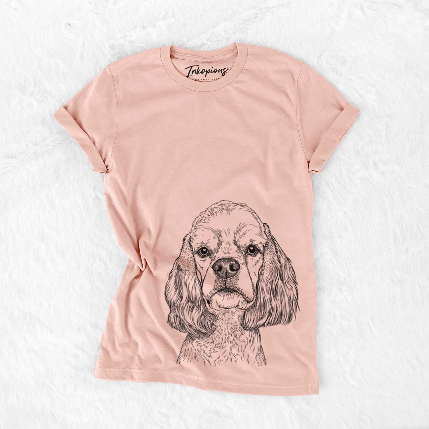 Hand-drawn sketch of Oakley the American Cocker Spaniel on a Peach Bella Canvas Unisex Crewneck