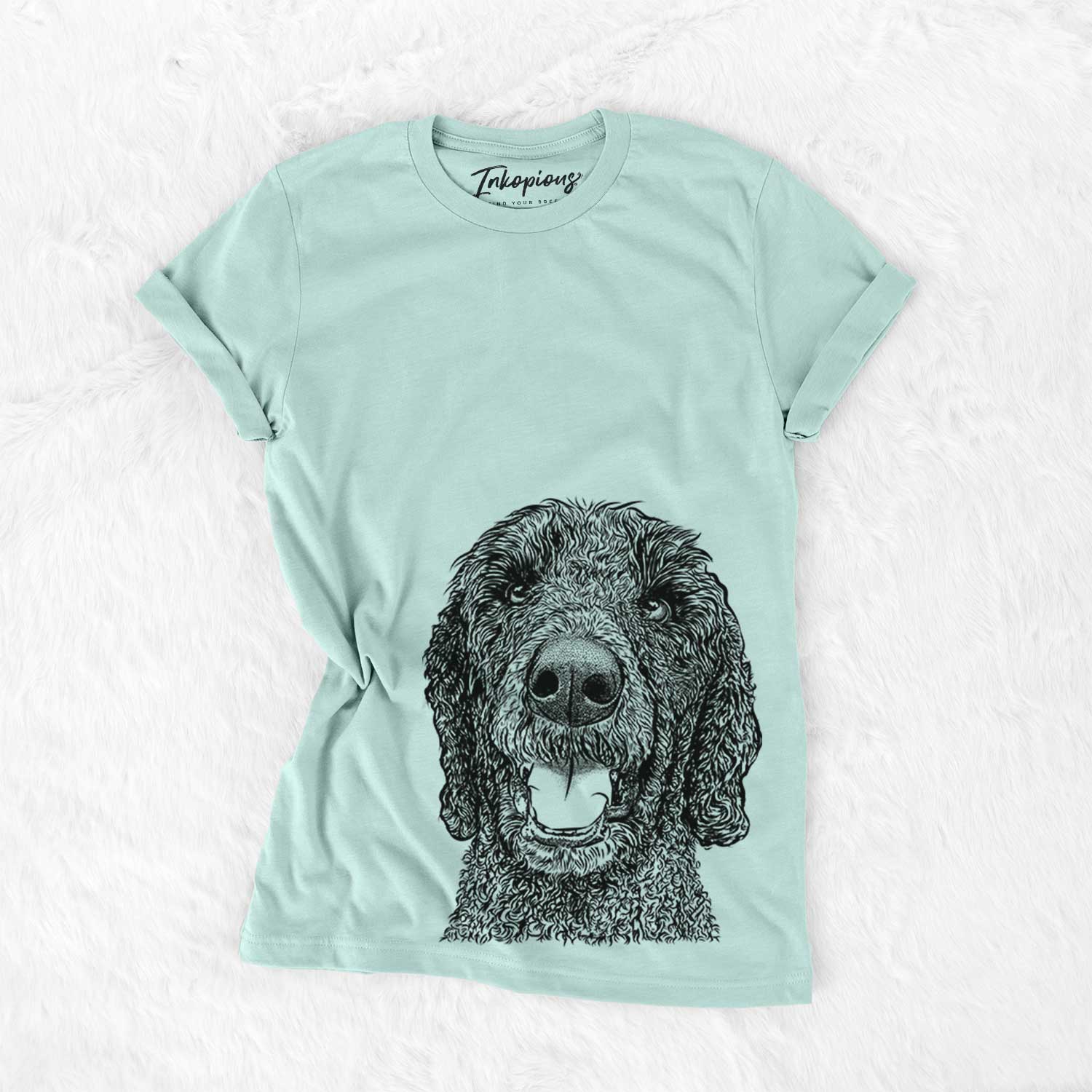 Hand-drawn sketch of Obi James the Goldendoodle on a Heather Sage Bella Canvas Unisex Crewneck